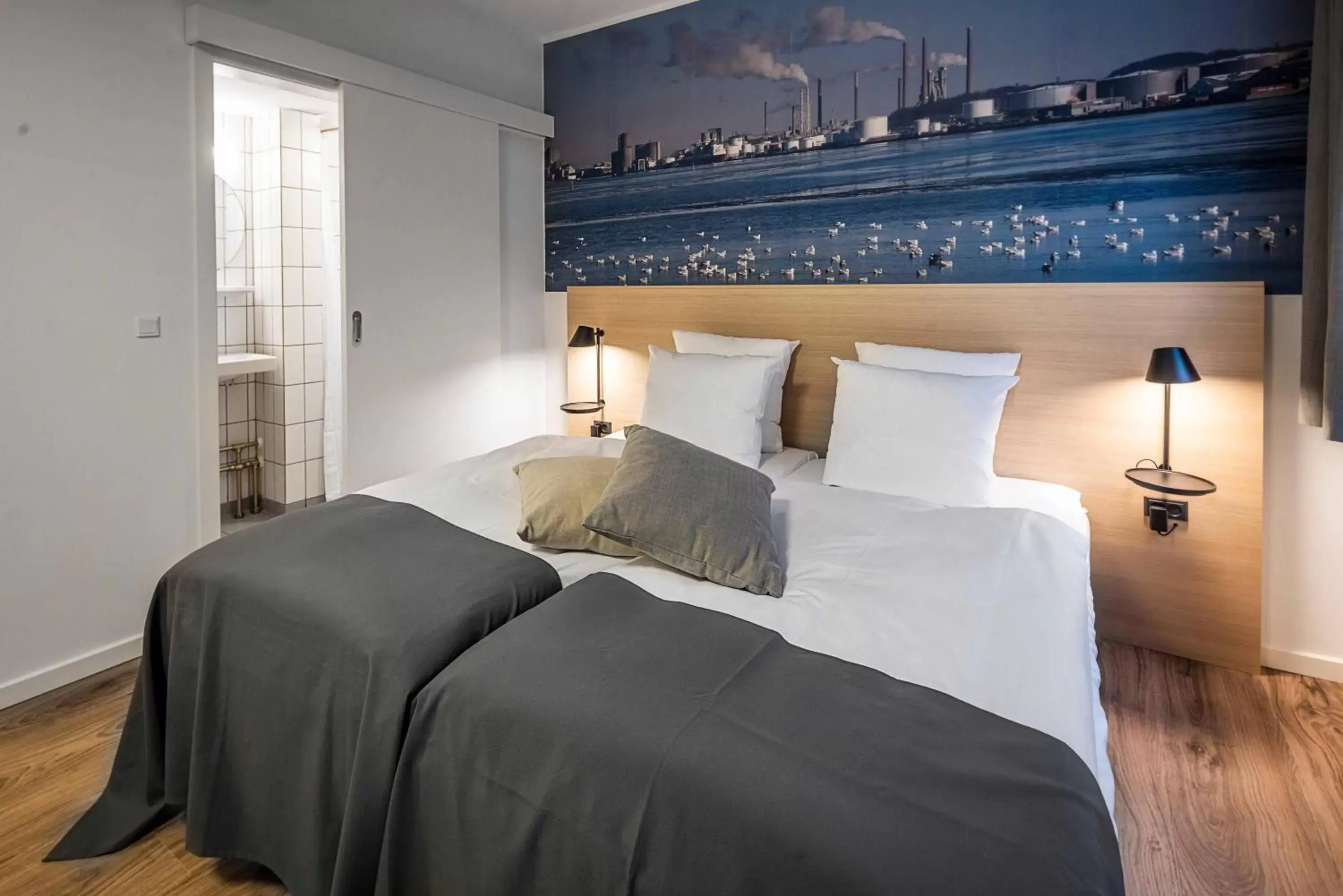 Bed in KOMPAS Hotel Aalborg Bed in KOMPAS Hotel Aalborg