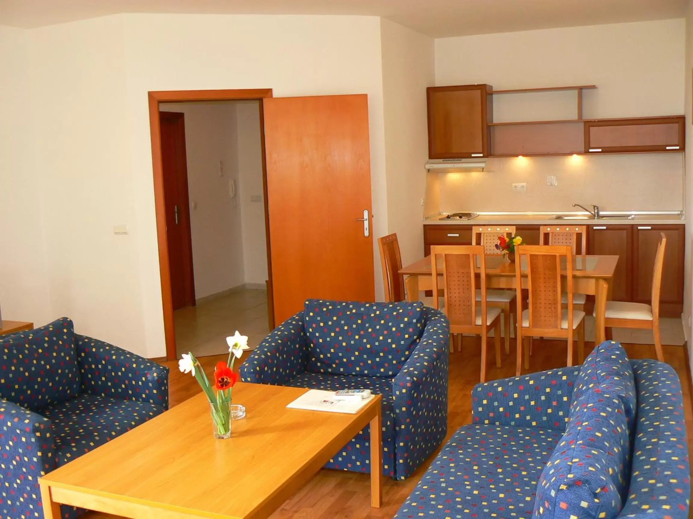 Kitchen or kitchenette, Seating Area in Joya Park Hotel