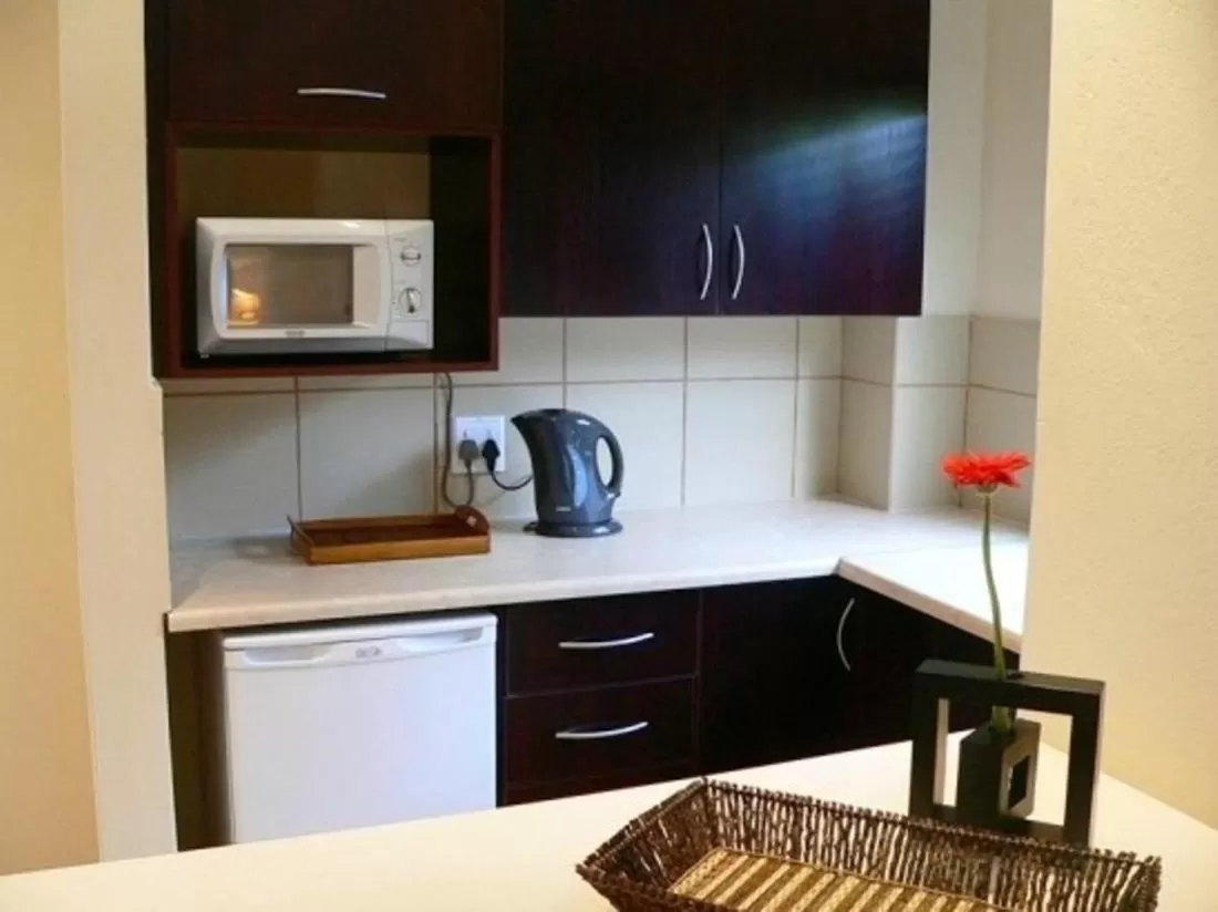 Kitchen or kitchenette in Rustenburg Boutique Hotel
