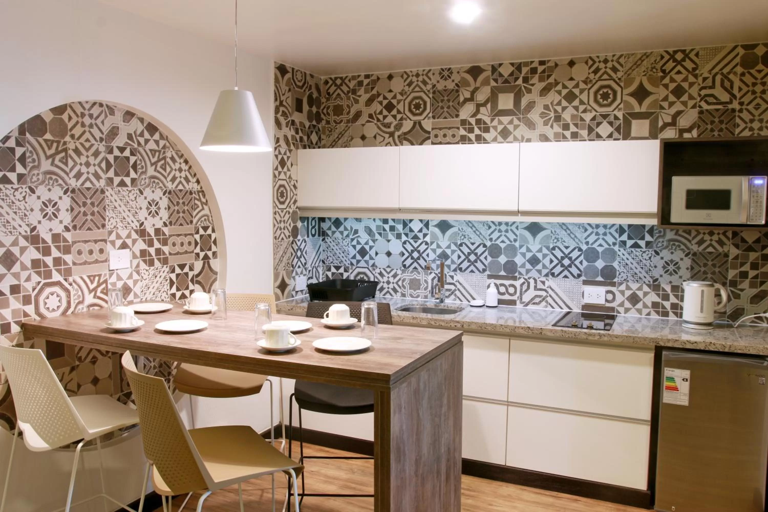 Kitchen or kitchenette in Urban Suites Apart Hotel