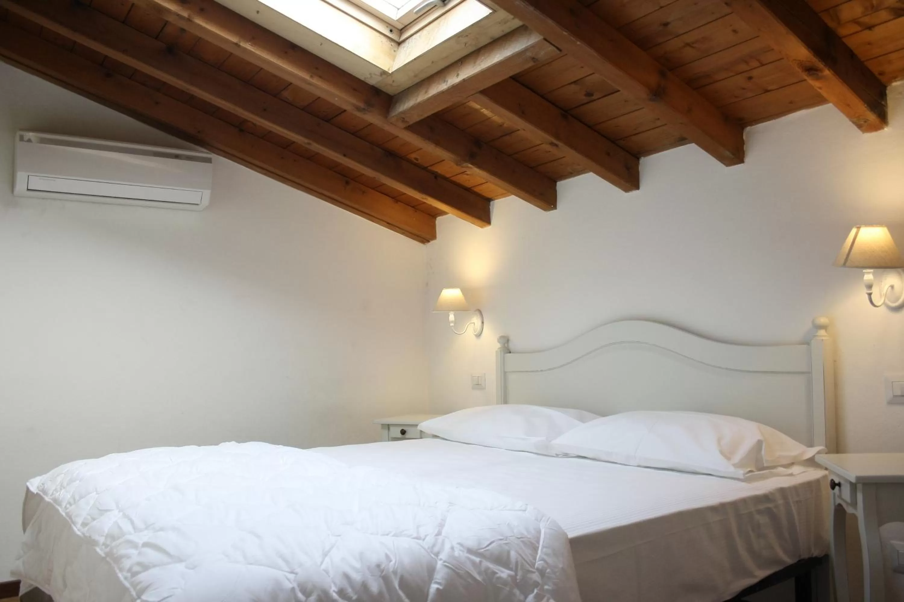 Photo of the whole room, Bed in Cascina Volta
