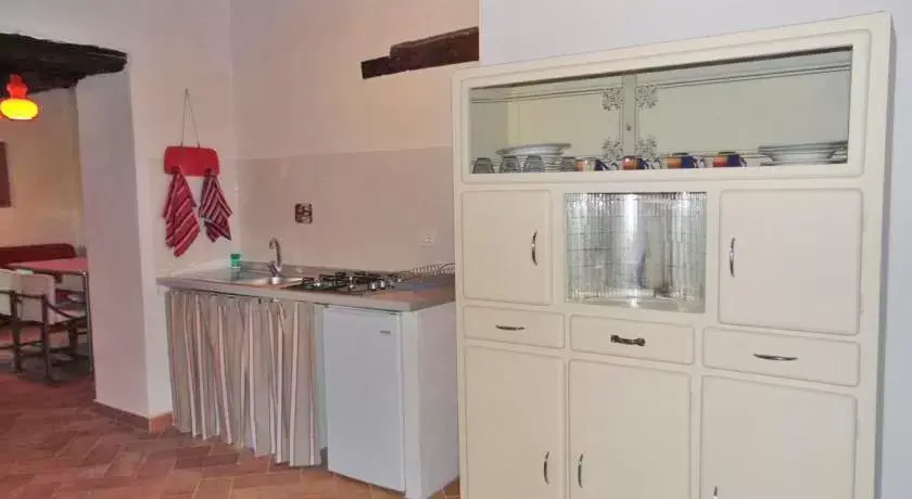 Property building, Kitchen/Kitchenette in Castello Girasole