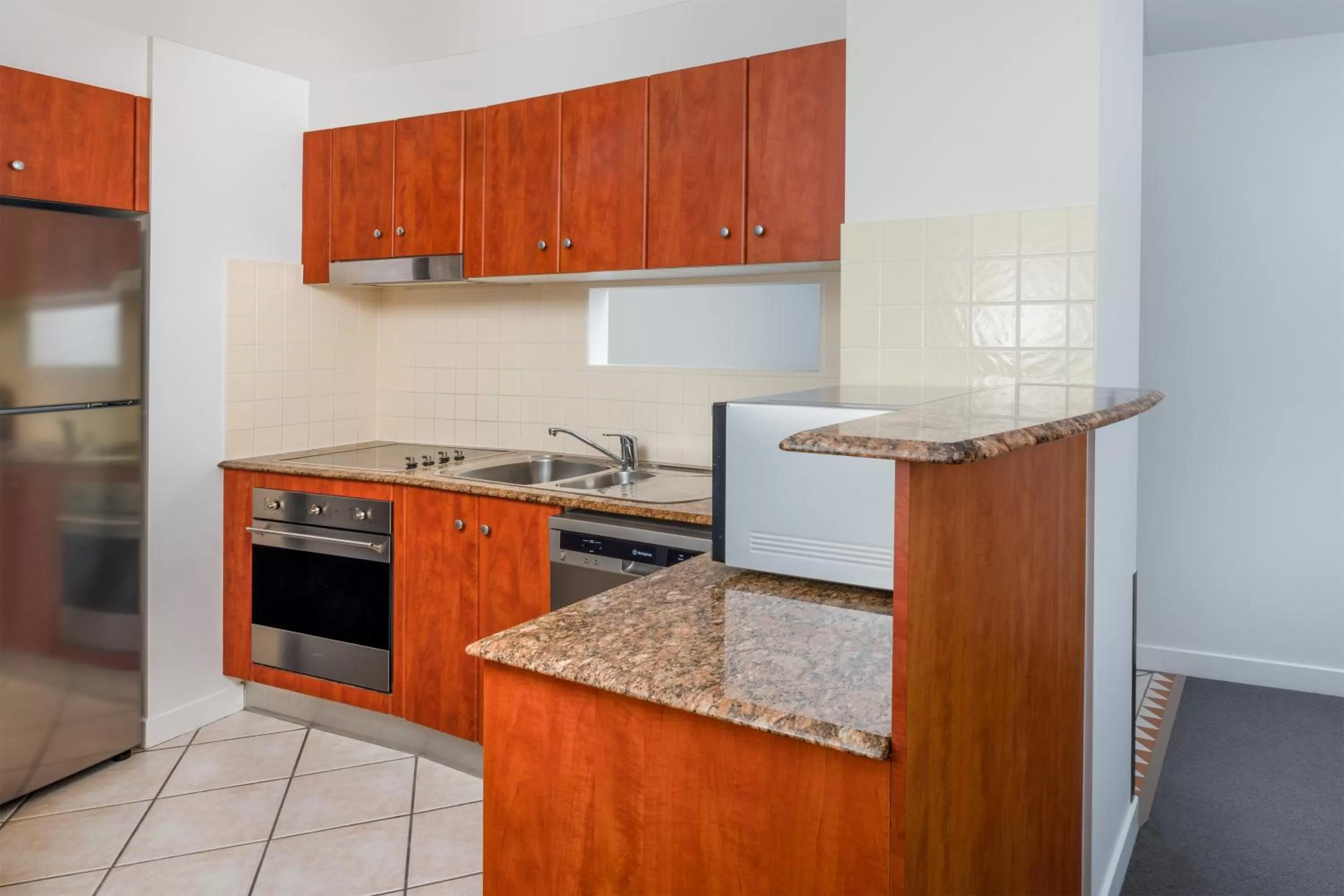 Kitchen or kitchenette in Mantra Mooloolaba Beach