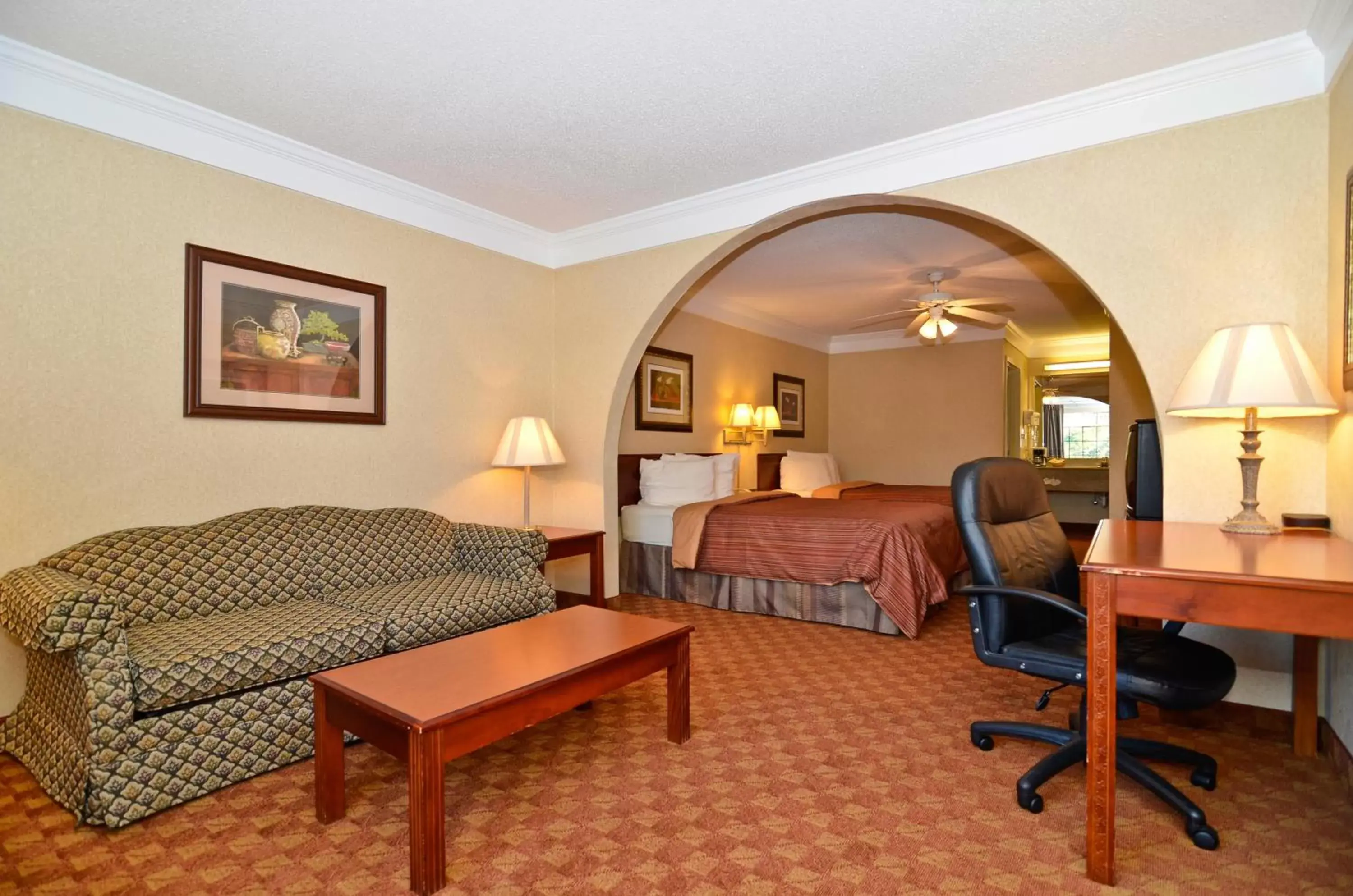 Photo of the whole room, Bed in Peach State Inn & Suites Photo of the whole room, Bed in Peach State Inn & Suites