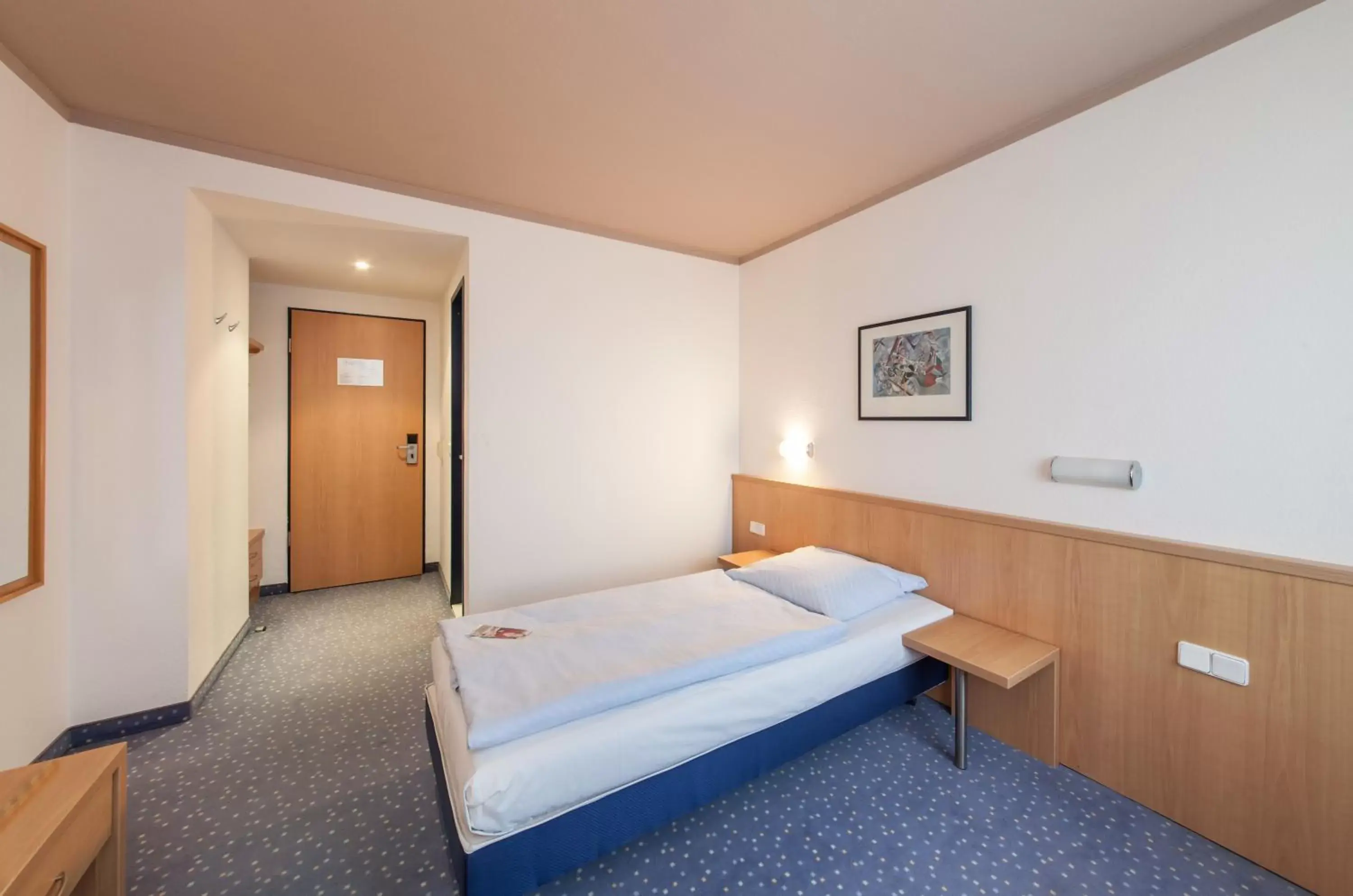 Photo of the whole room, Bed in Novum Hotel Seegraben Cottbus