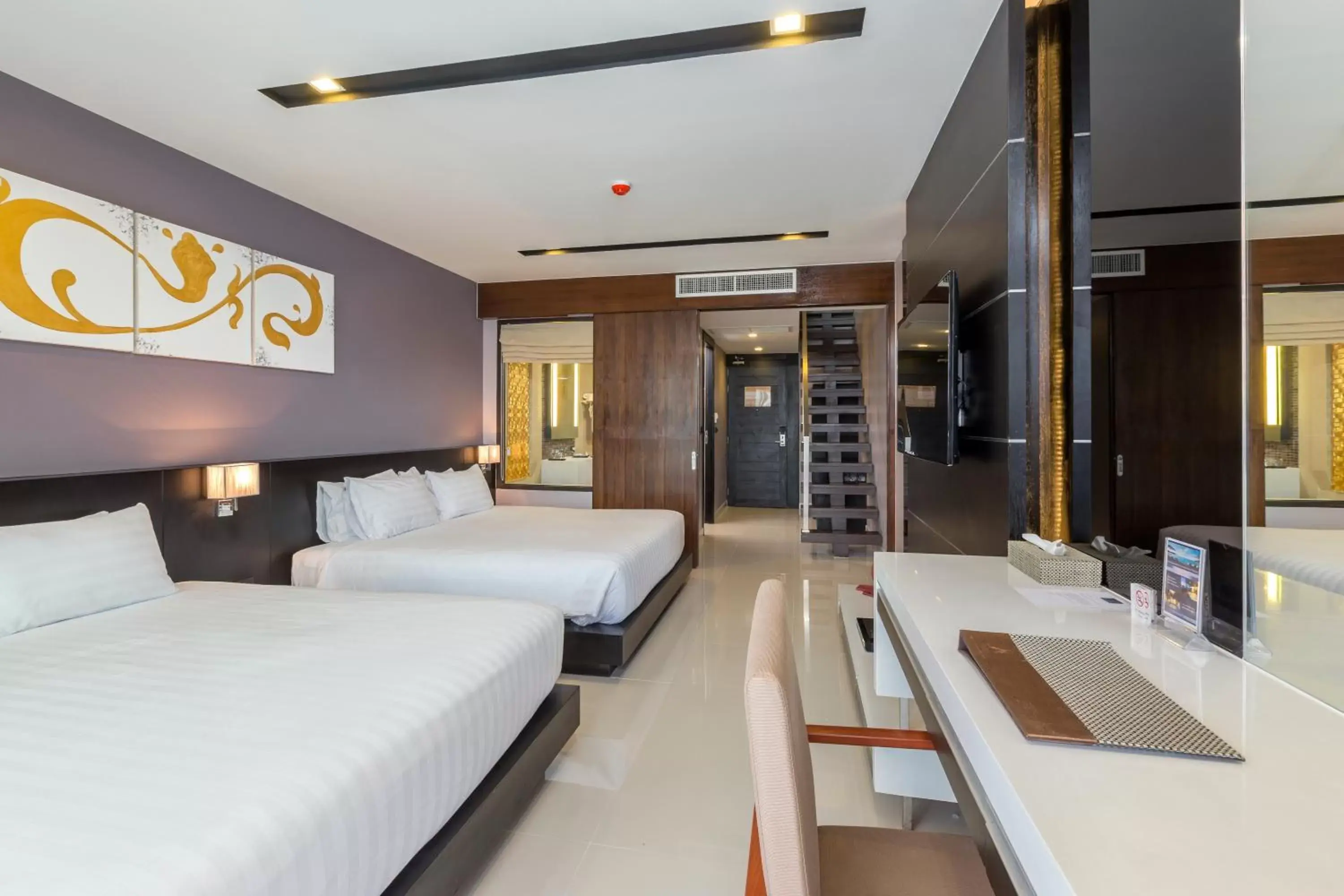 Family One-Bedroom Suite in The Charm Resort Phuket - SHA Certified