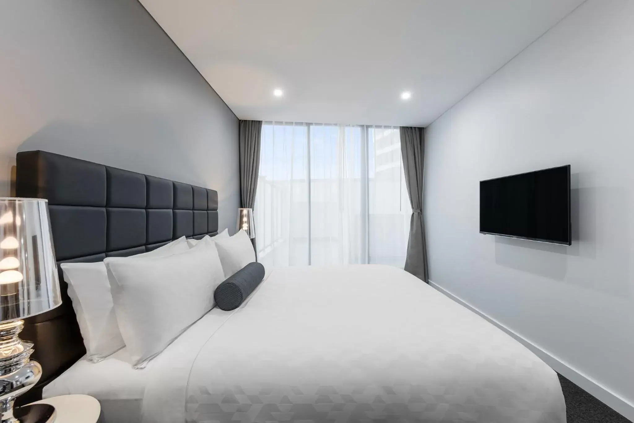 Bed in Meriton Suites Church Street, Parramatta