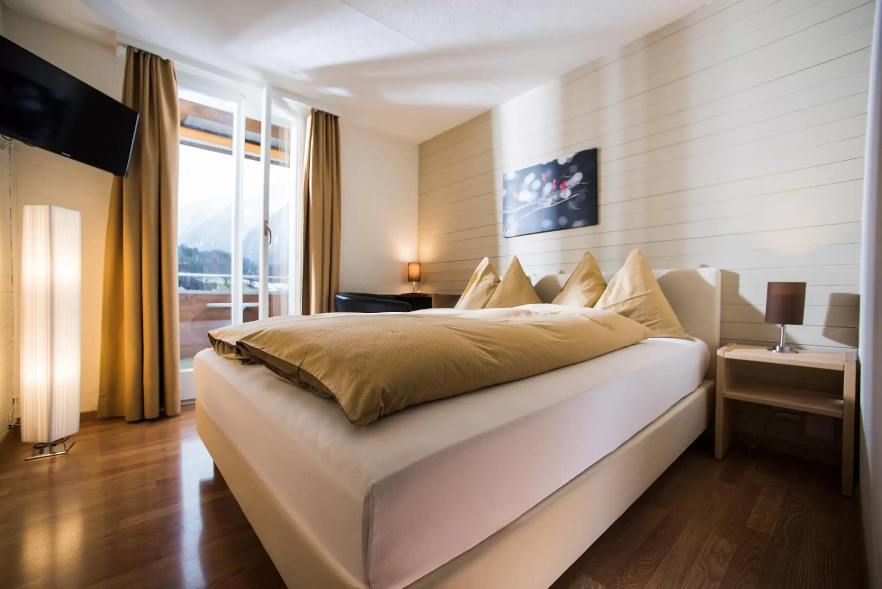 Landmark view, Bed in Jungfrau Hotel