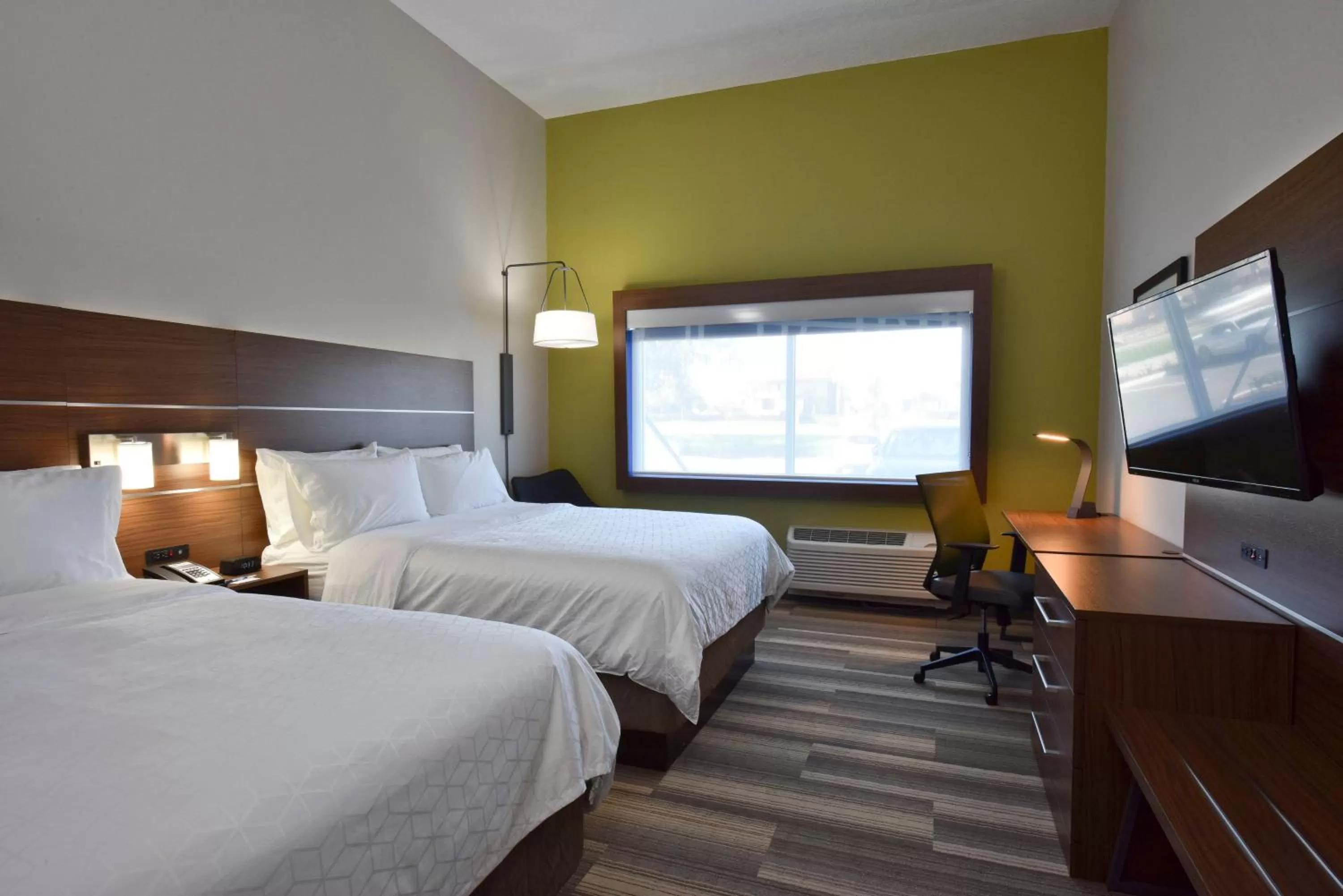 Photo of the whole room, Bed in Holiday Inn Express & Suites - Orlando - Southeast by IHG