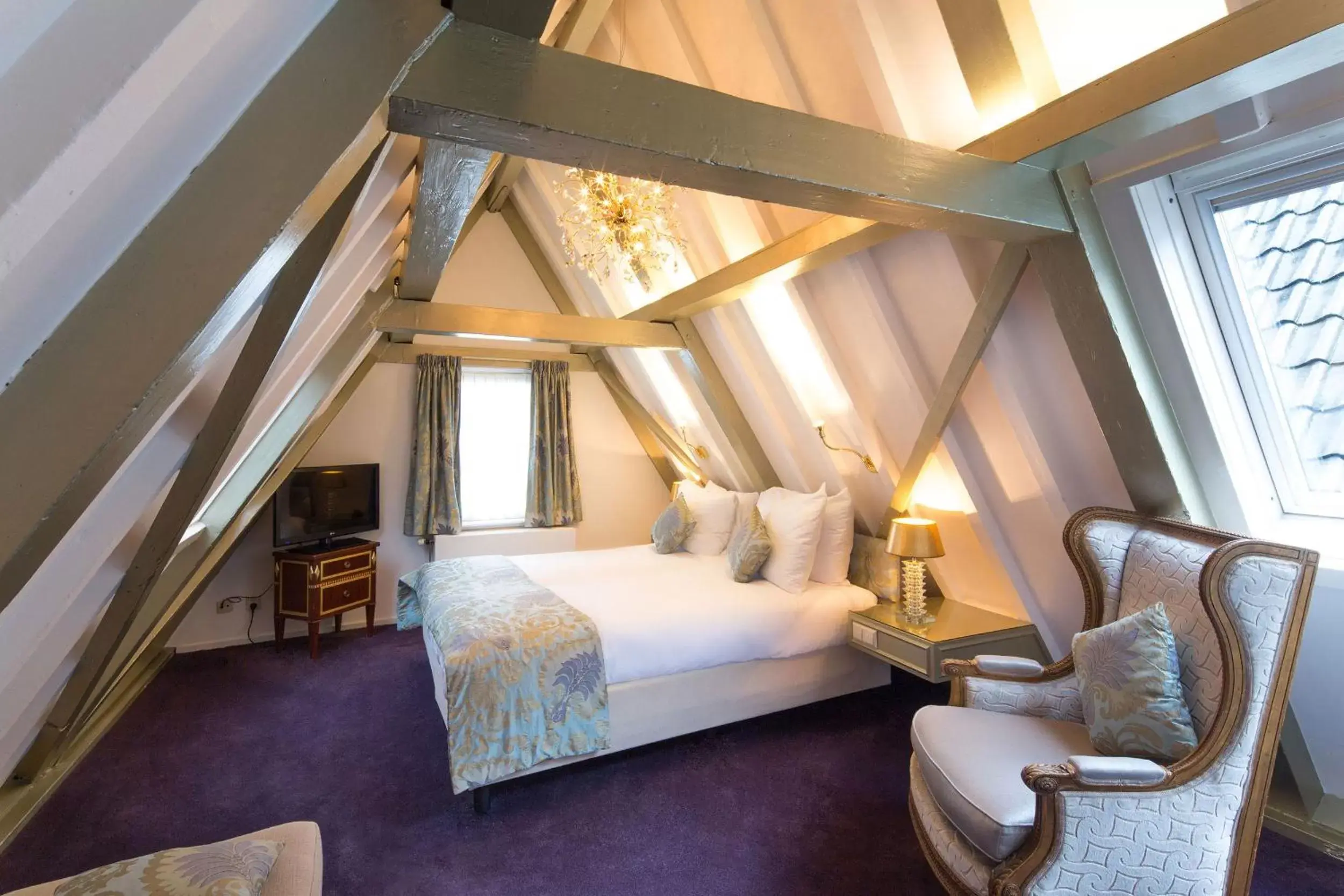 Bed, Room Photo in Ambassade Hotel