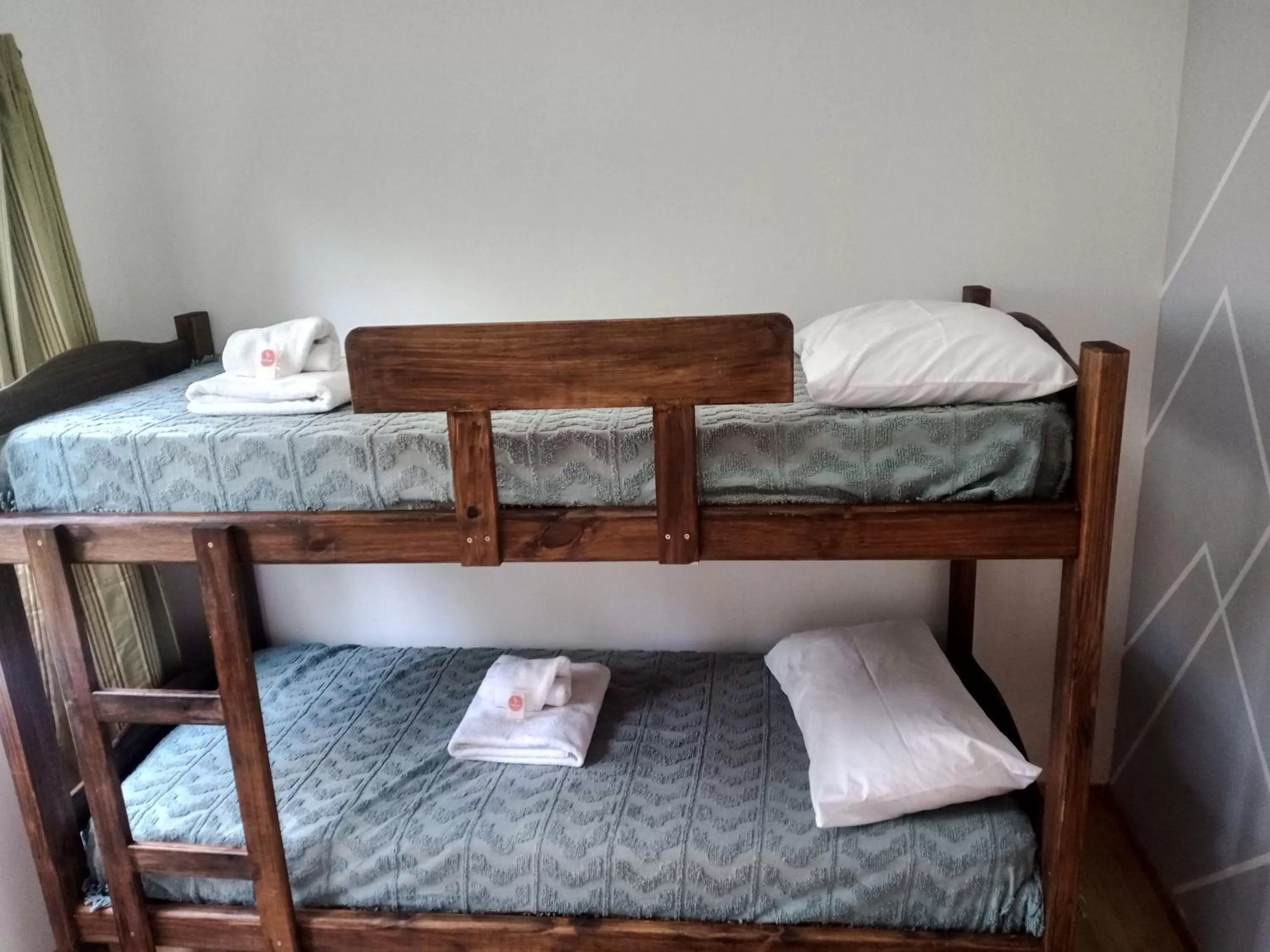 Decorative detail, Bed in Flamenco Bay Apartments