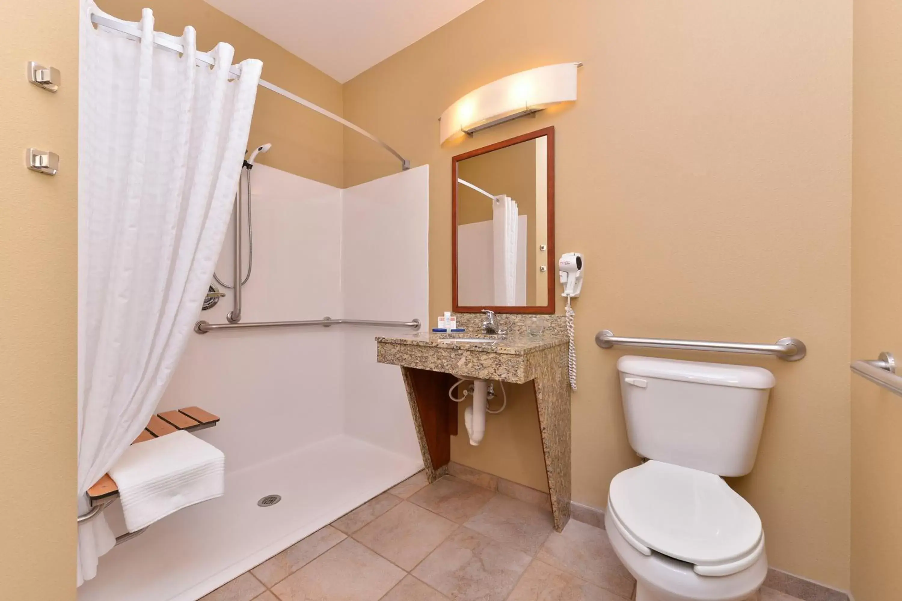 Photo of the whole room, Bathroom in Candlewood Suites Williston, an IHG Hotel