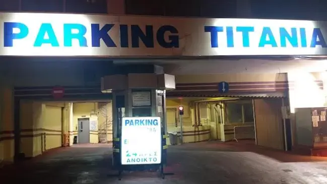 Parking, Property Logo/Sign in Titania Hotel