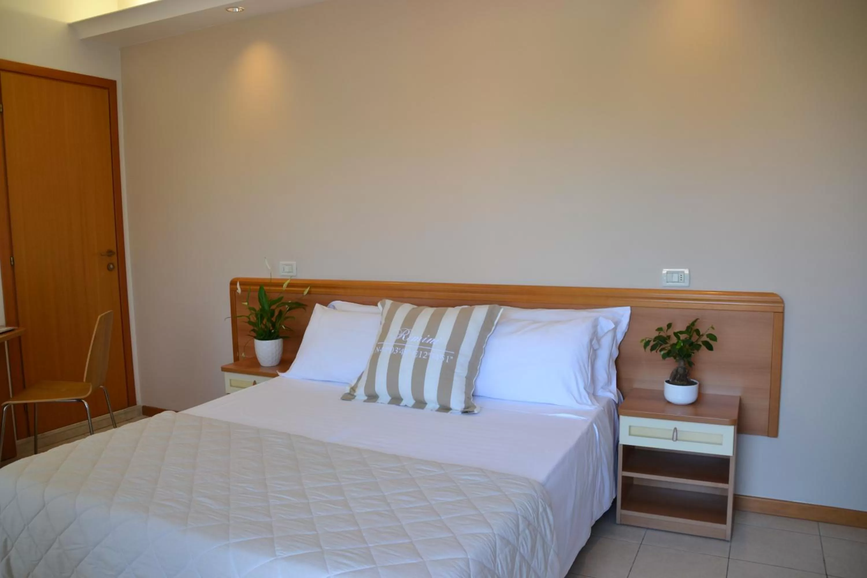 Bed in Hotel Apogeo - Breakfast Experience