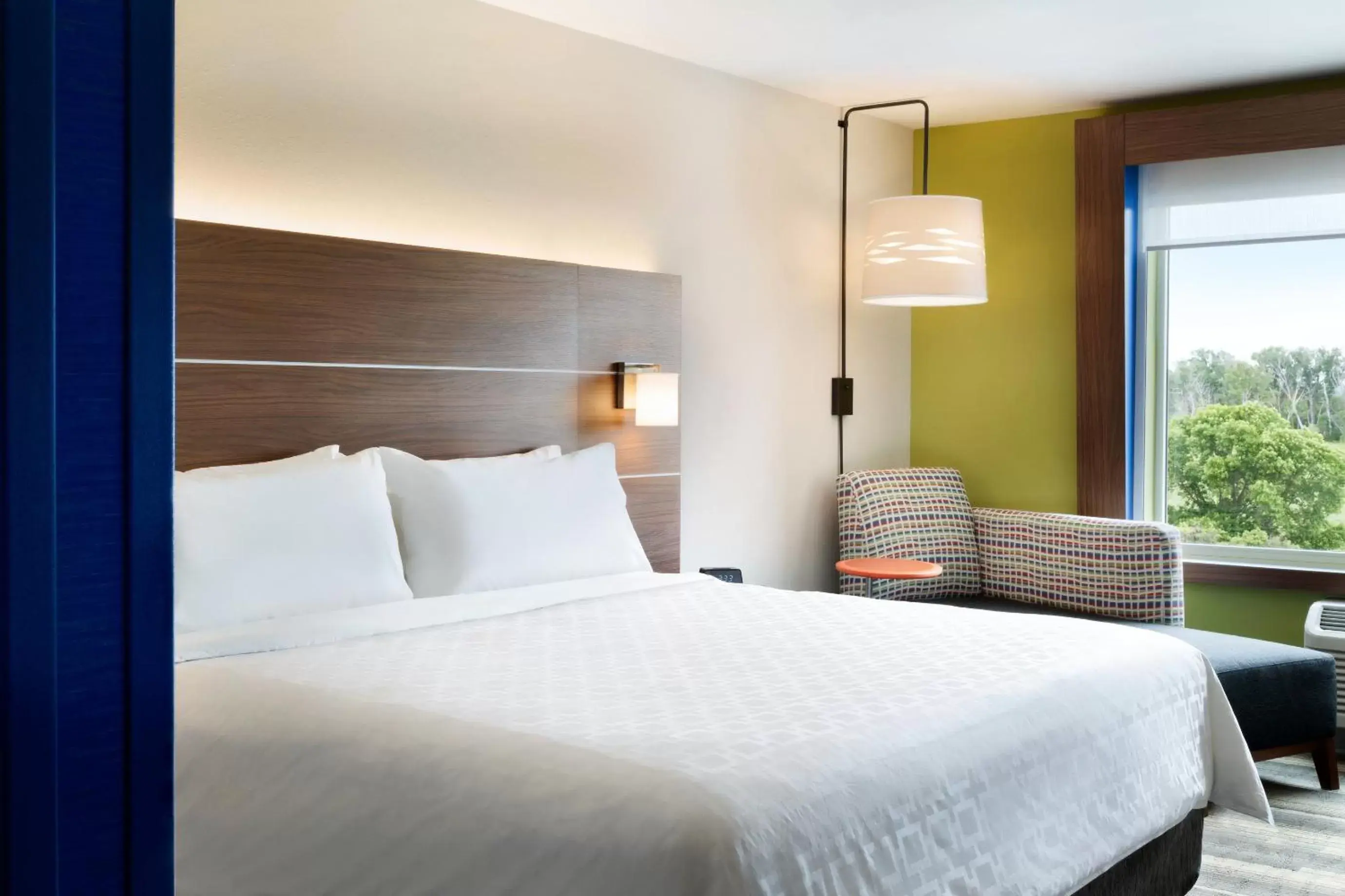 Bed in Holiday Inn Express & Suites - Milwaukee West Allis, an IHG Hotel