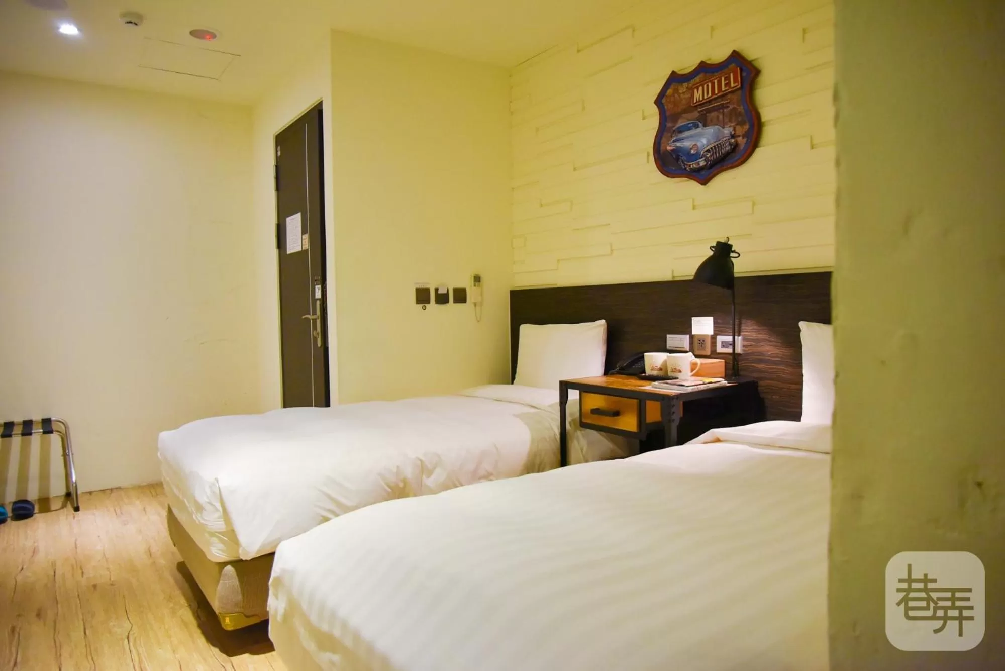 Bed in Re-Change Hotel Taipei