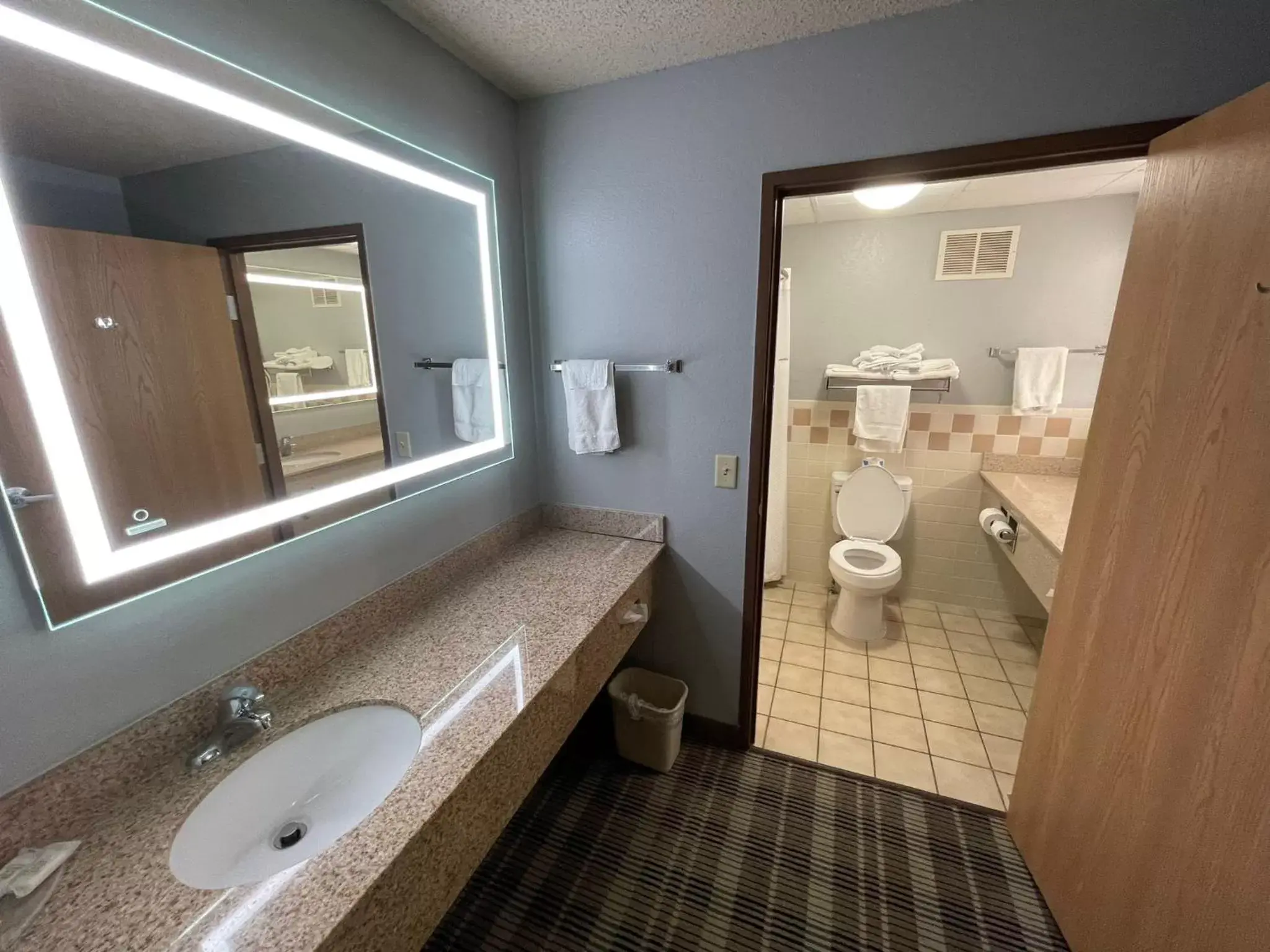 Bathroom in AmericInn by Wyndham Sayre