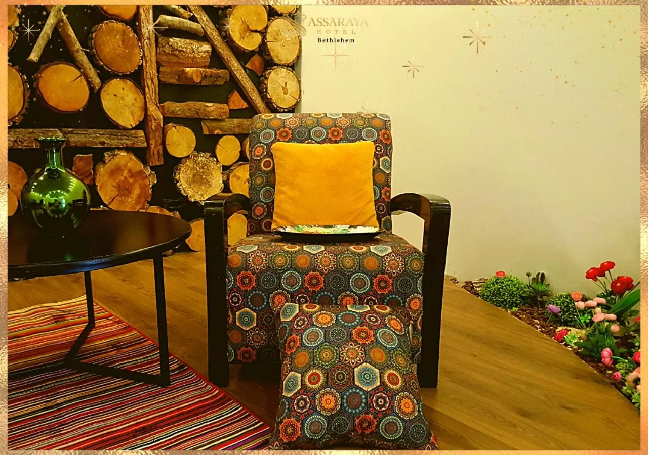 Communal lounge/ TV room in Assaraya Palace Hotel