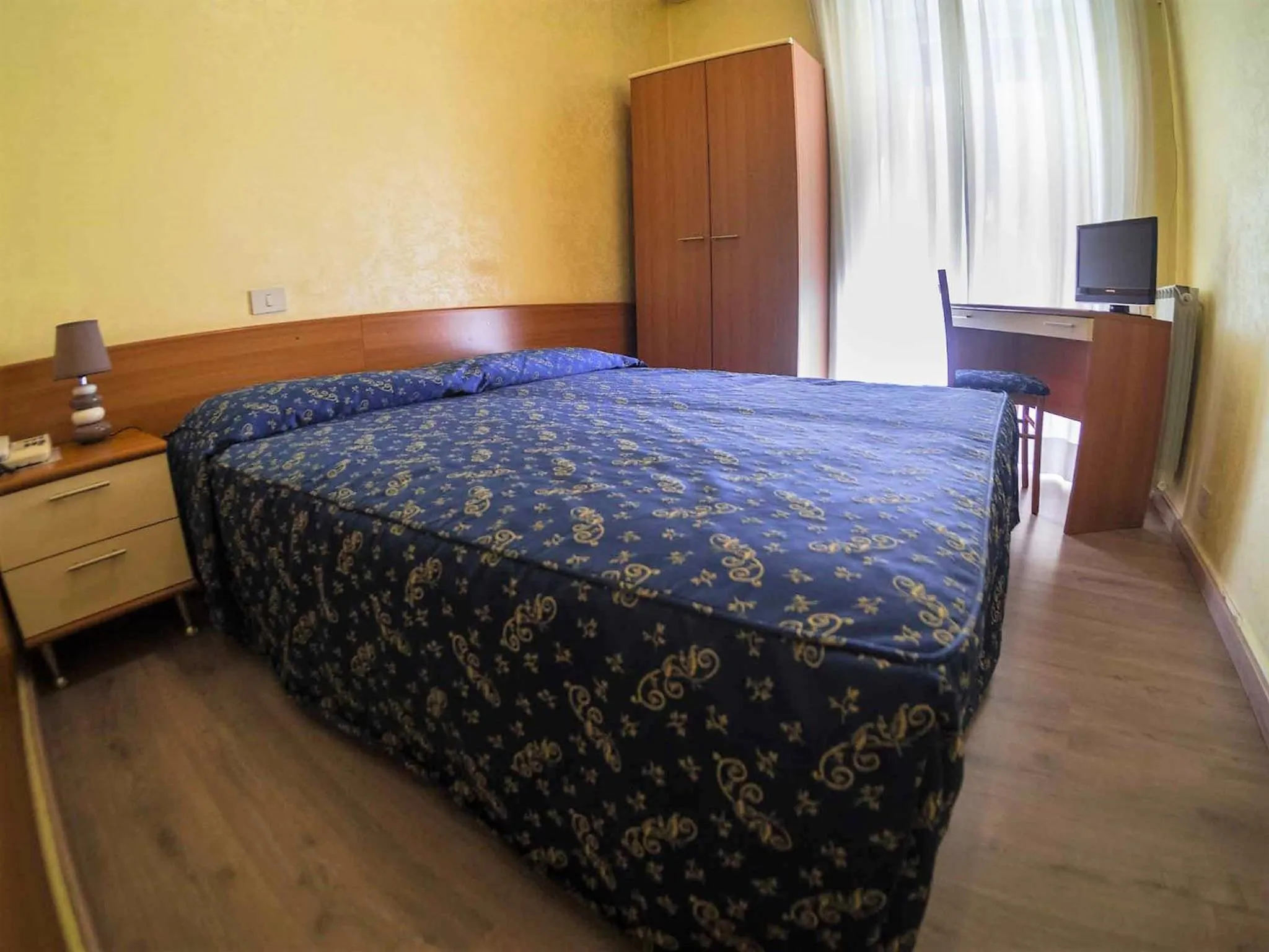 Bed in Albergo Dei Leoni