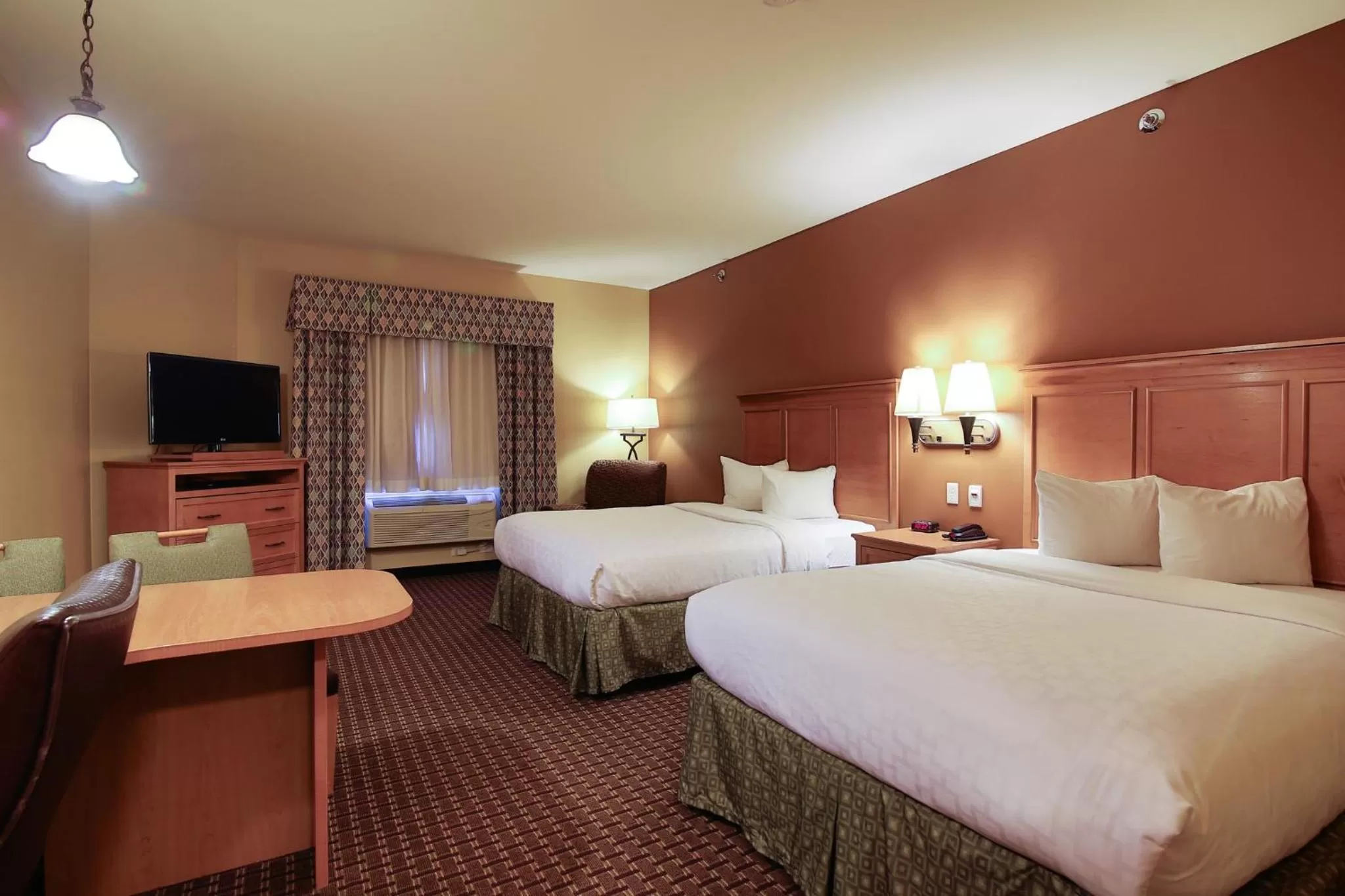 Deluxe Queen Room with Two Queen Beds - Non-Smoking in Hawthorn Extended Stay by Wyndham Minot