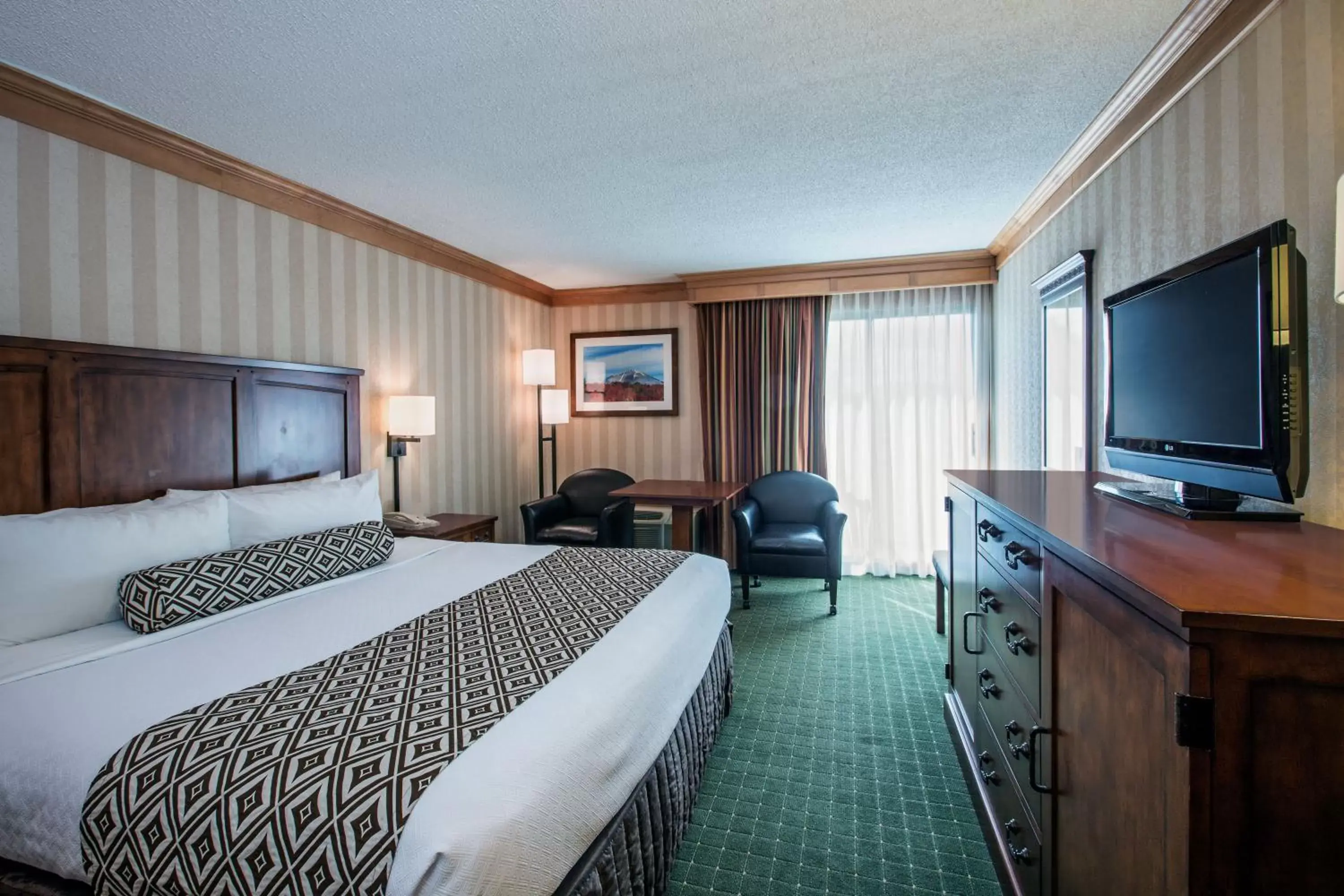 Photo of the whole room, TV/Entertainment Center in Crowne Plaza Lake Placid, an IHG Hotel