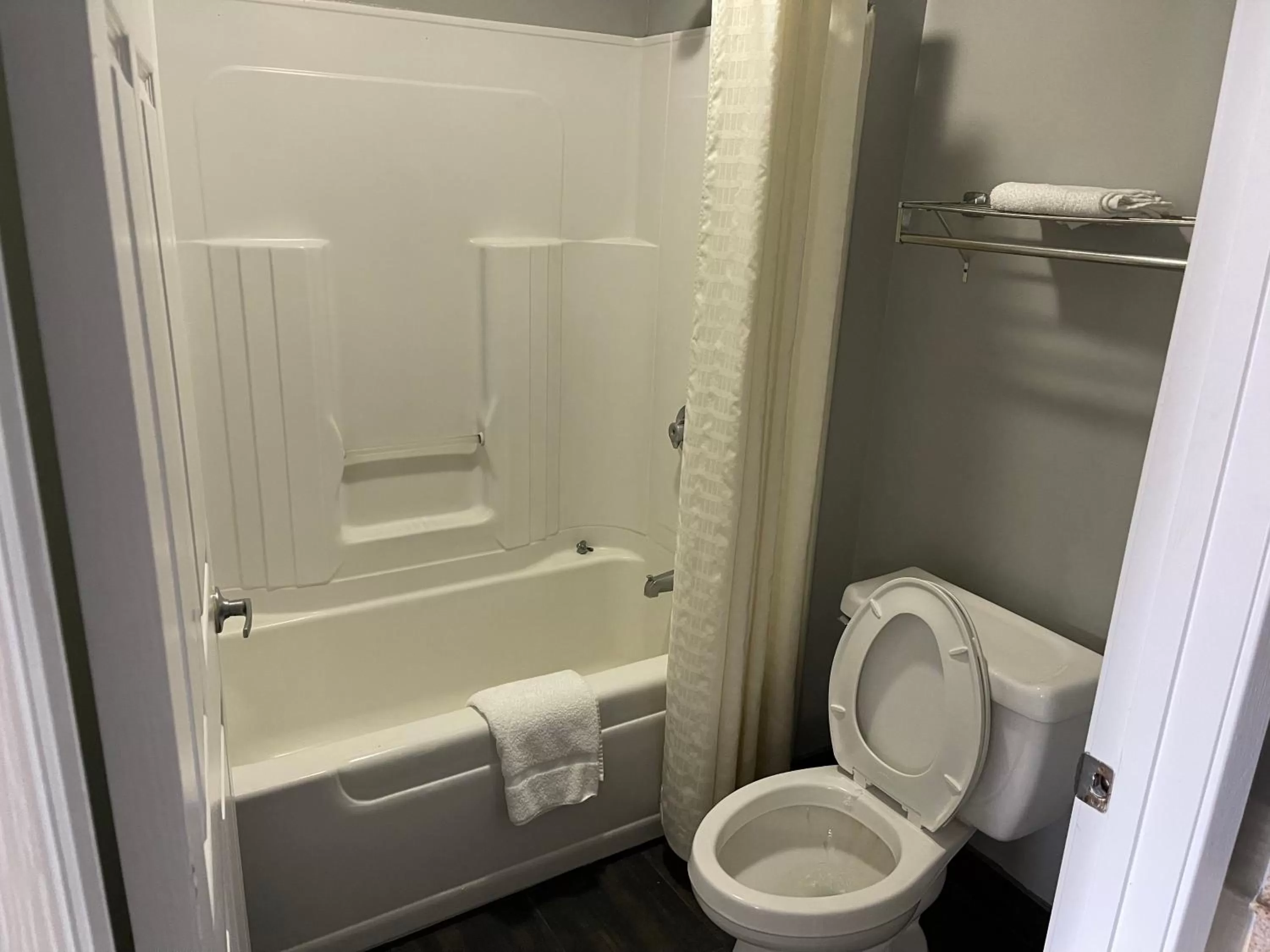 Bathroom in Super 6 Inn & Suites