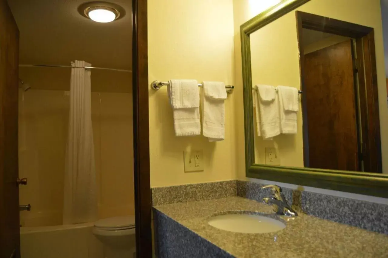 Bathroom in Scottish Inn & Suites - Eau Claire