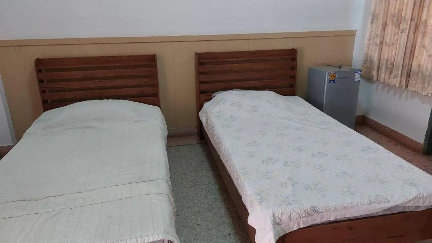 Bed in Sataya Apartment