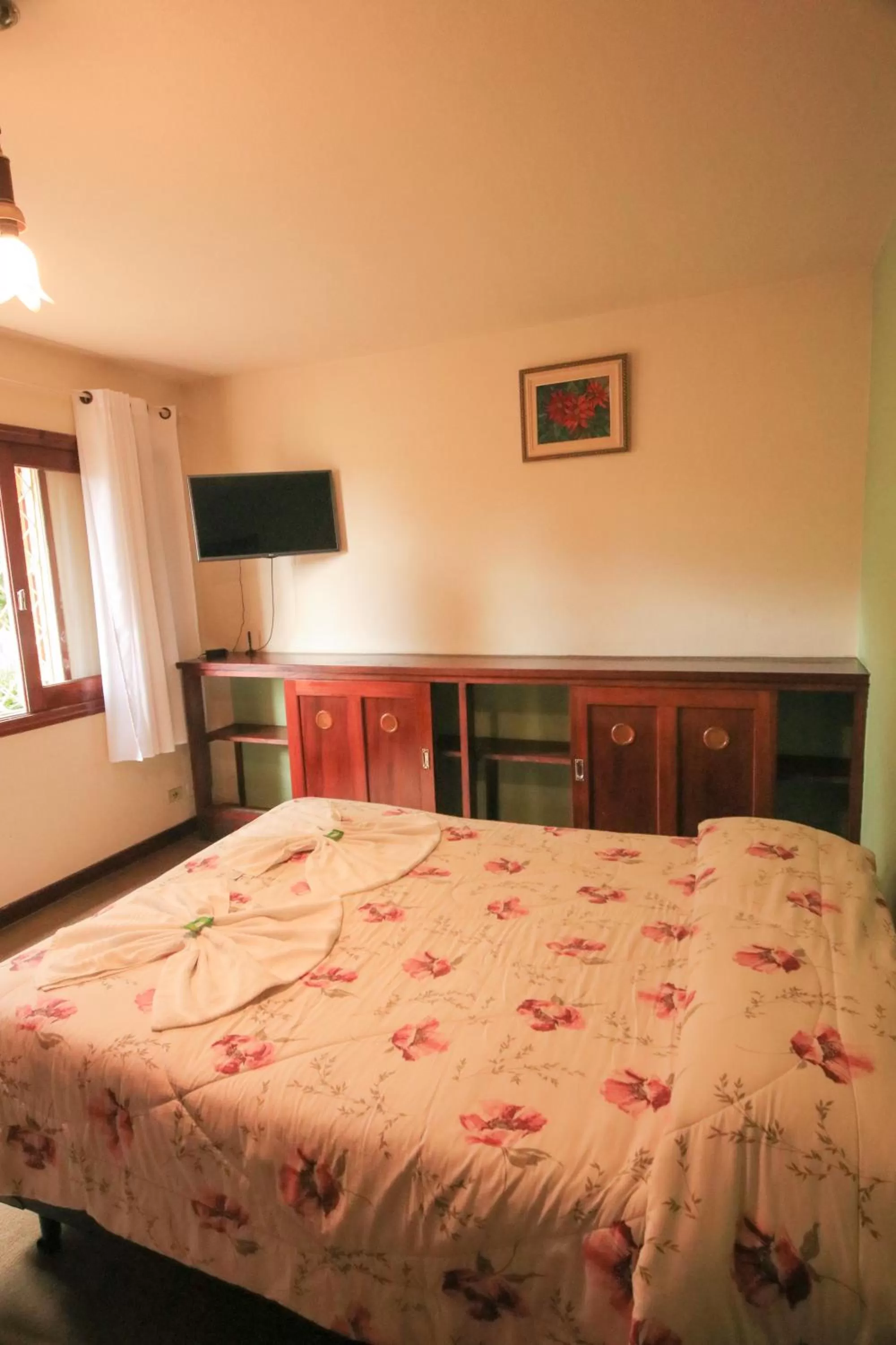 Bed in Pousada Curumi