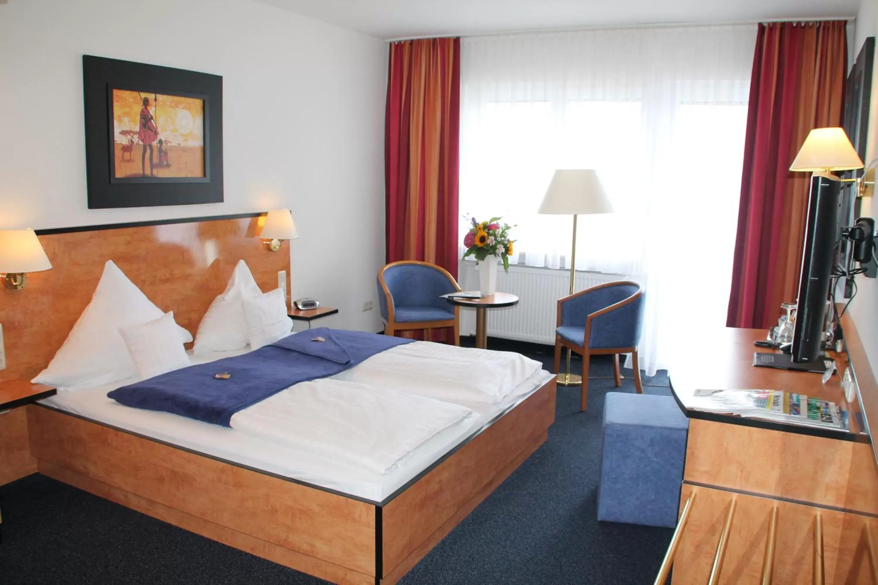 Photo of the whole room, Bed in Trip Inn Hotel Zum Riesen Hanau