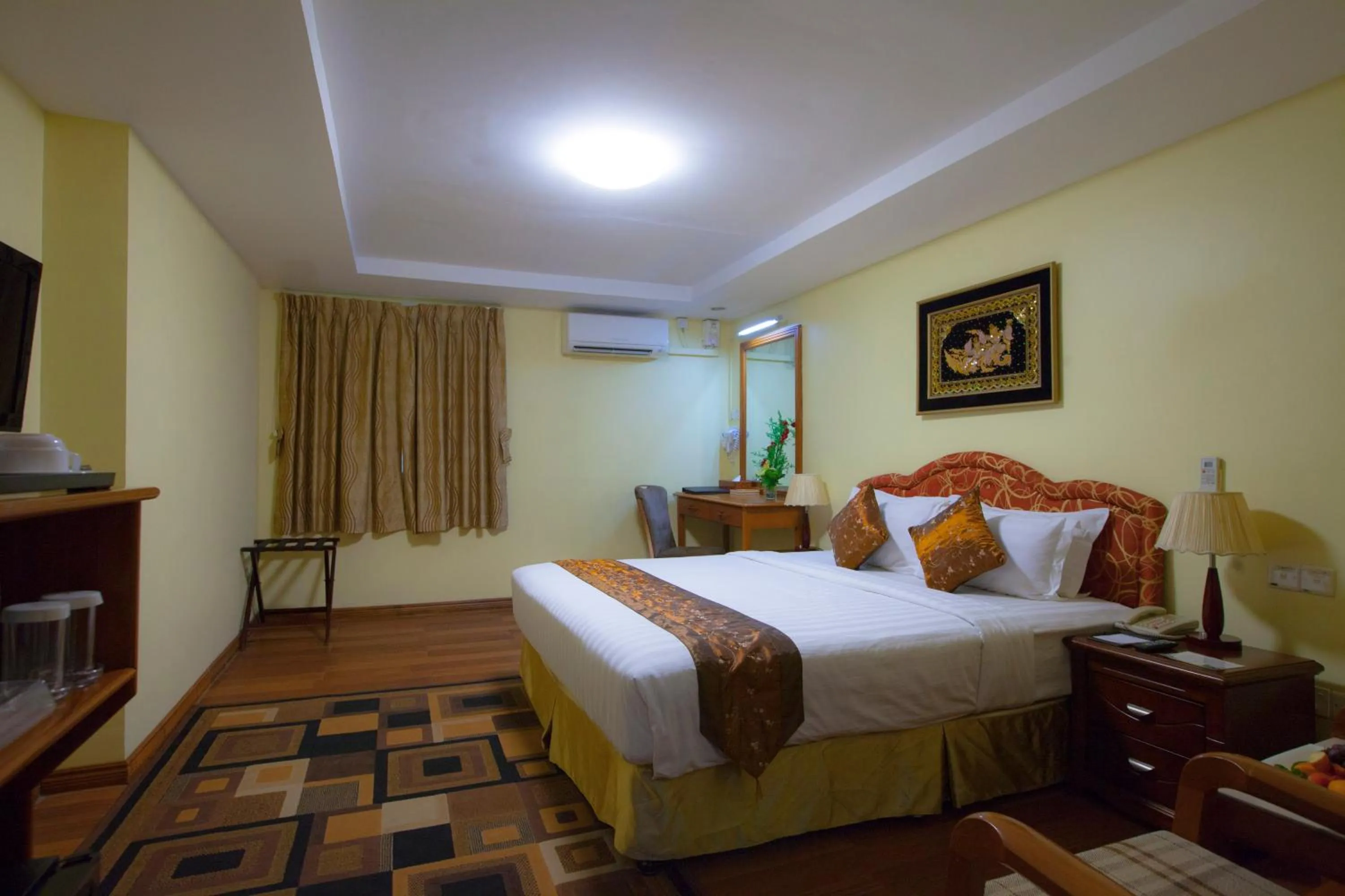 Bed in Grand Palace Hotel