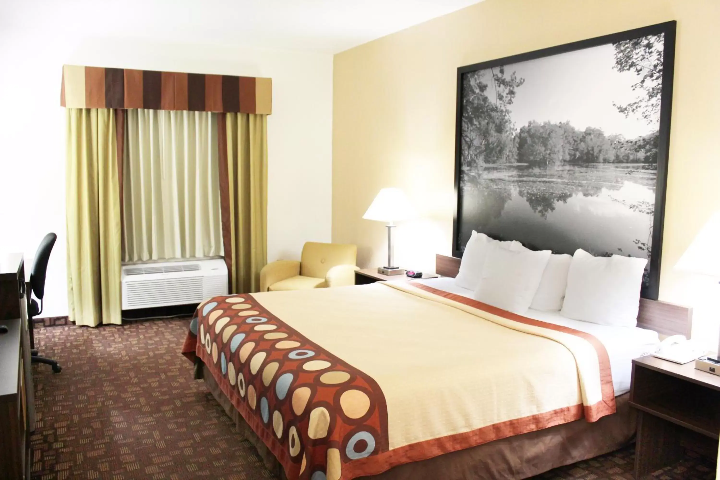 Bed in Super 8 by Wyndham Three Rivers