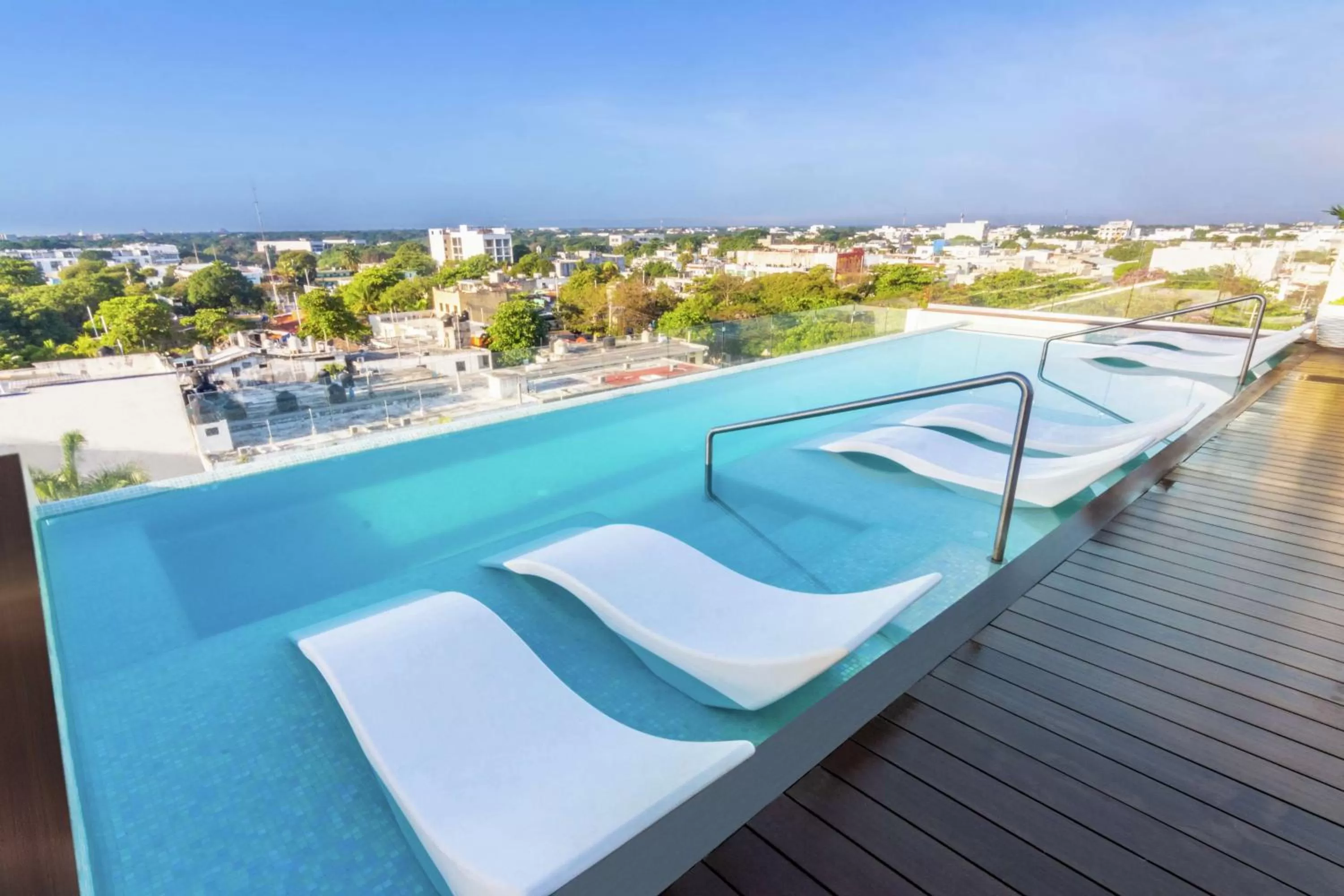 Pool view in The Fives Downtown Hotel & Residences, Curio Collection by Hilton