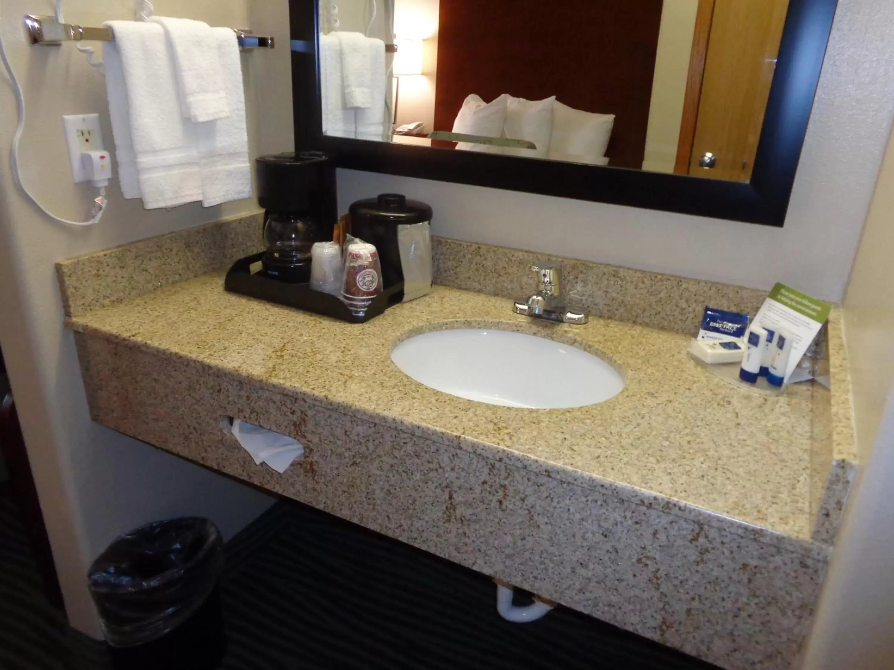 Bathroom in AmericInn by Wyndham Des Moines Airport