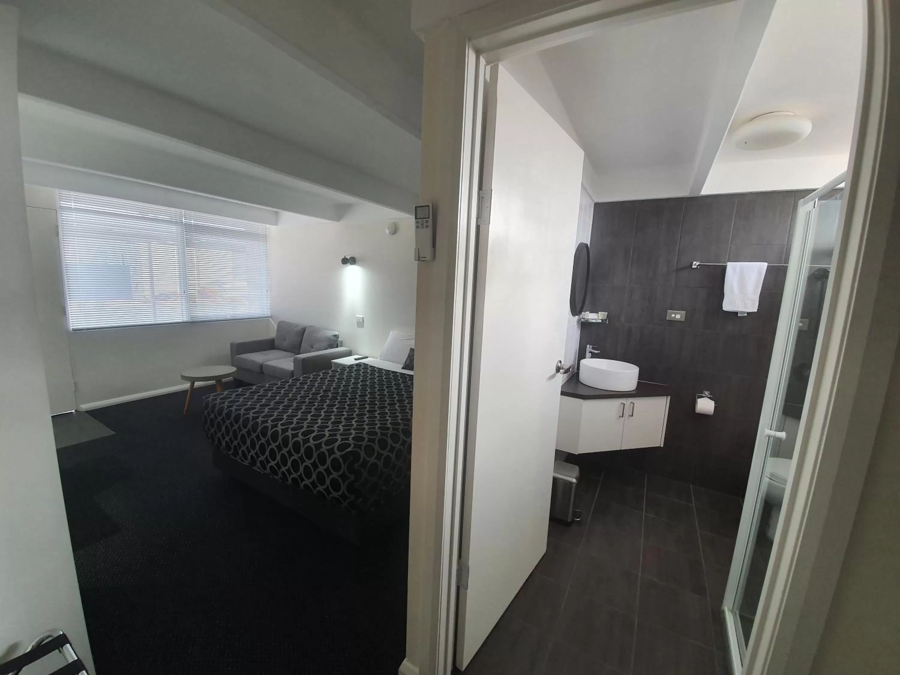 Bed in Charles Sturt Motor Inn