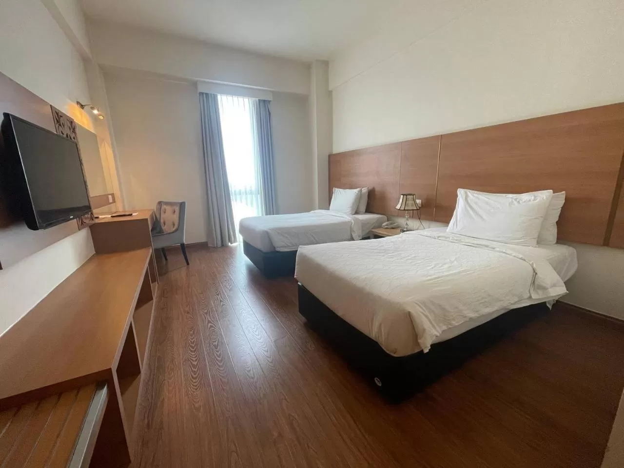 Bed in Swan Garden Hotel