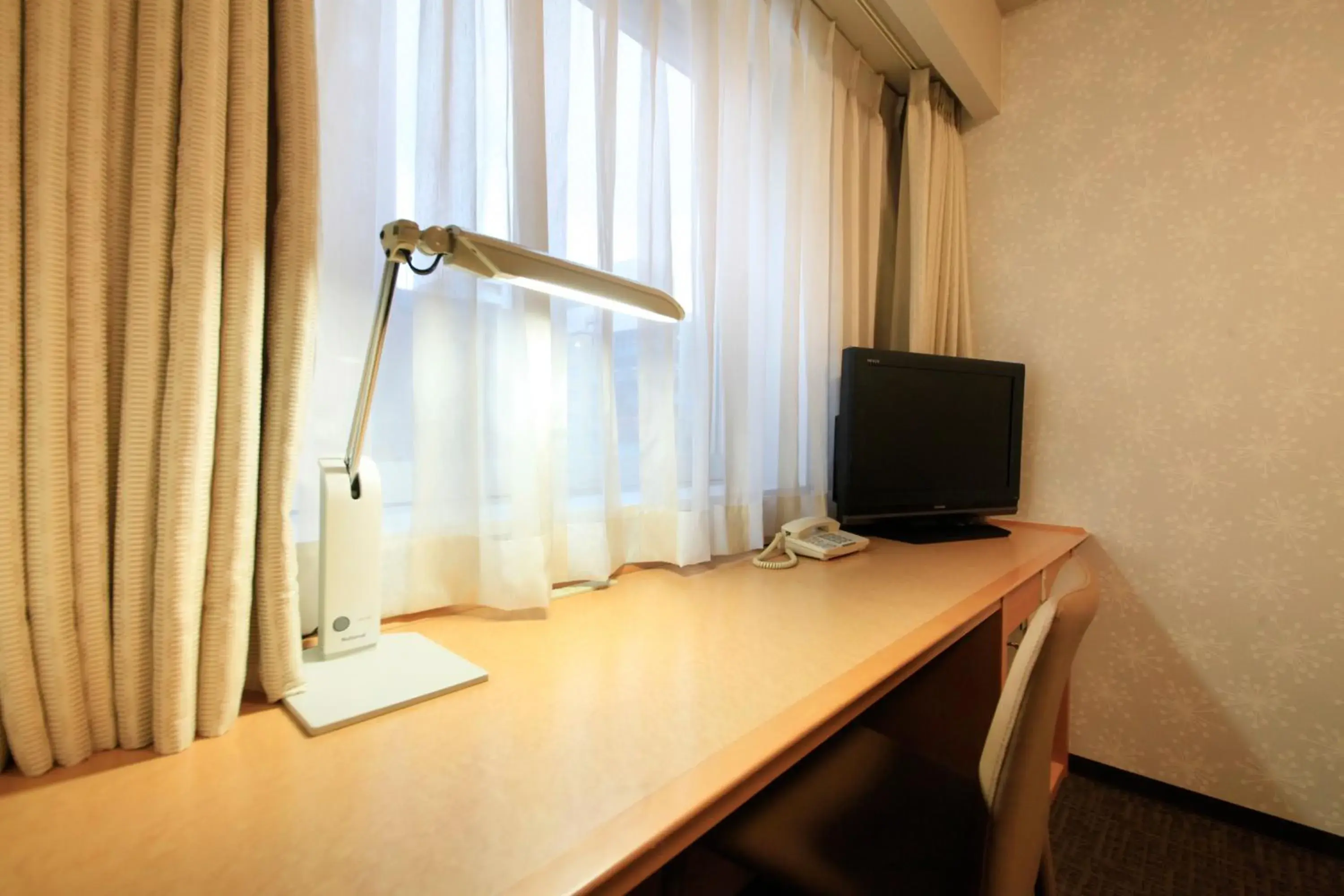 Photo of the whole room, TV/Entertainment Center in Richmond Hotel Sapporo Ekimae