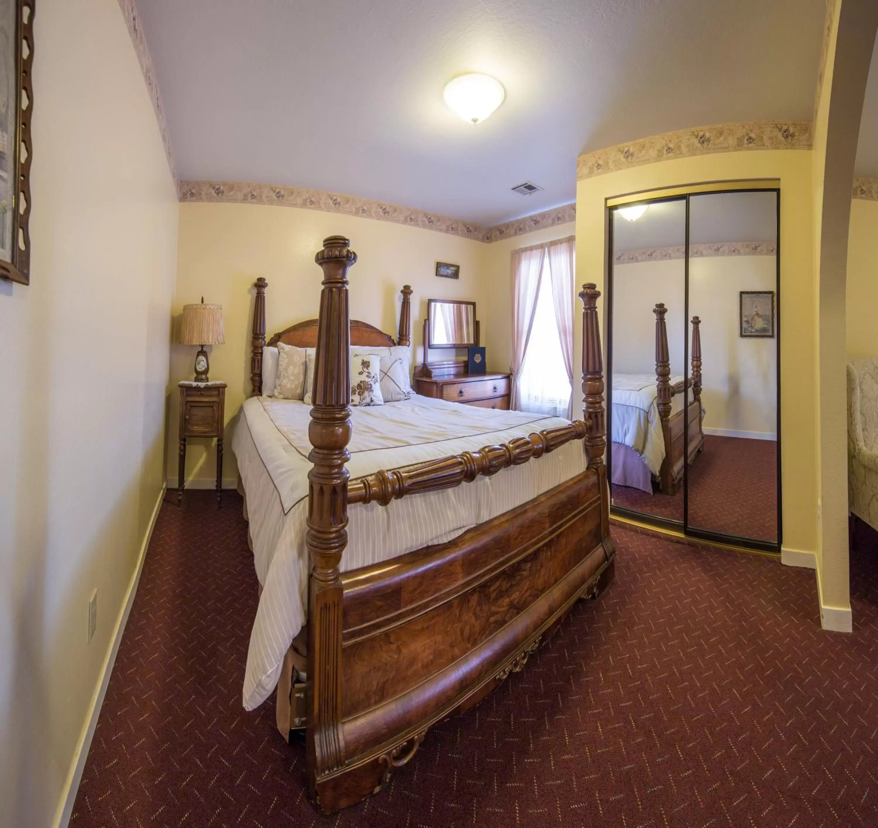 Bed in Historic Cary House Hotel