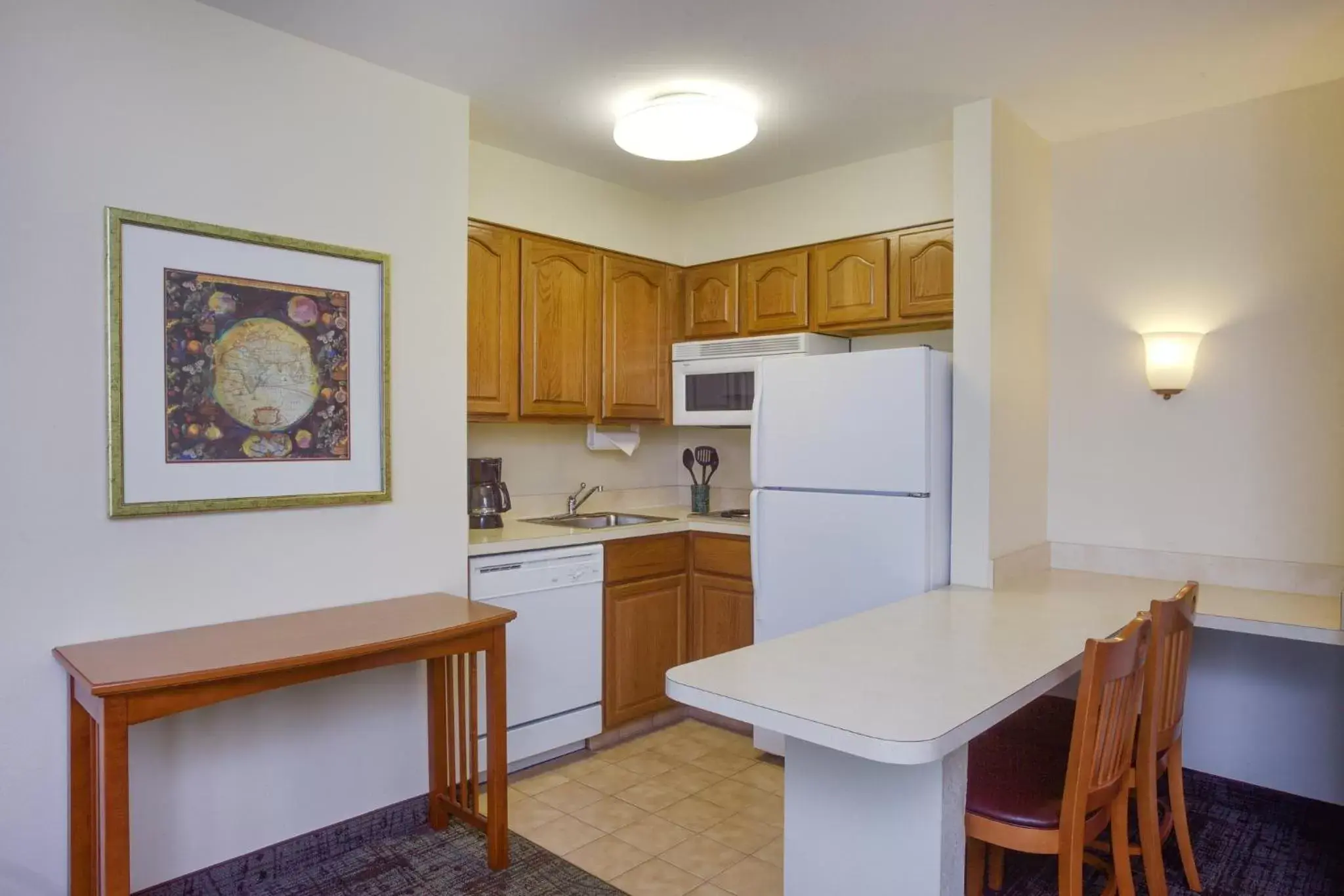 Photo of the whole room, Kitchen/Kitchenette in Staybridge Suites Corning, an IHG Hotel