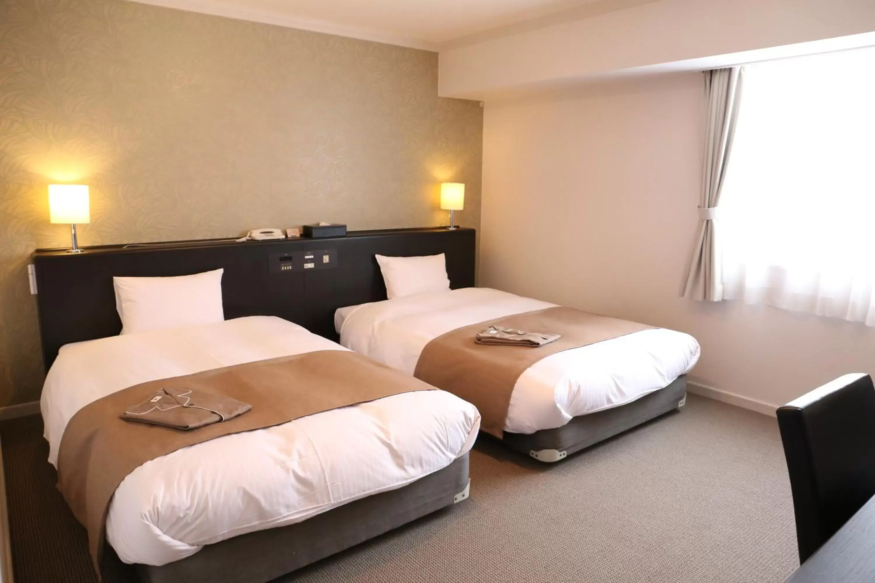 Bed in Hotel Royal Stay Sapporo