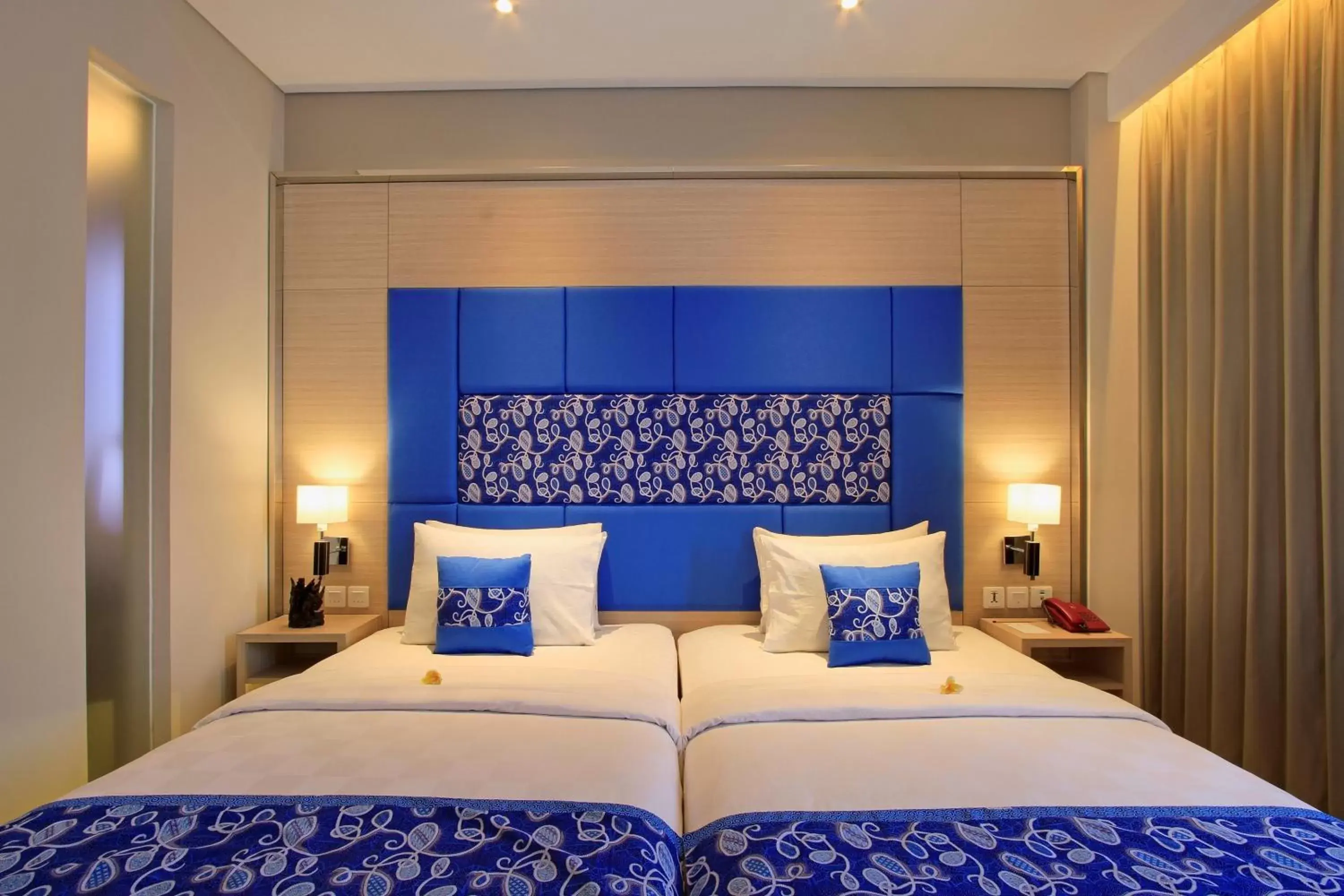 Photo of the whole room, Bed in Ohana Hotel Kuta