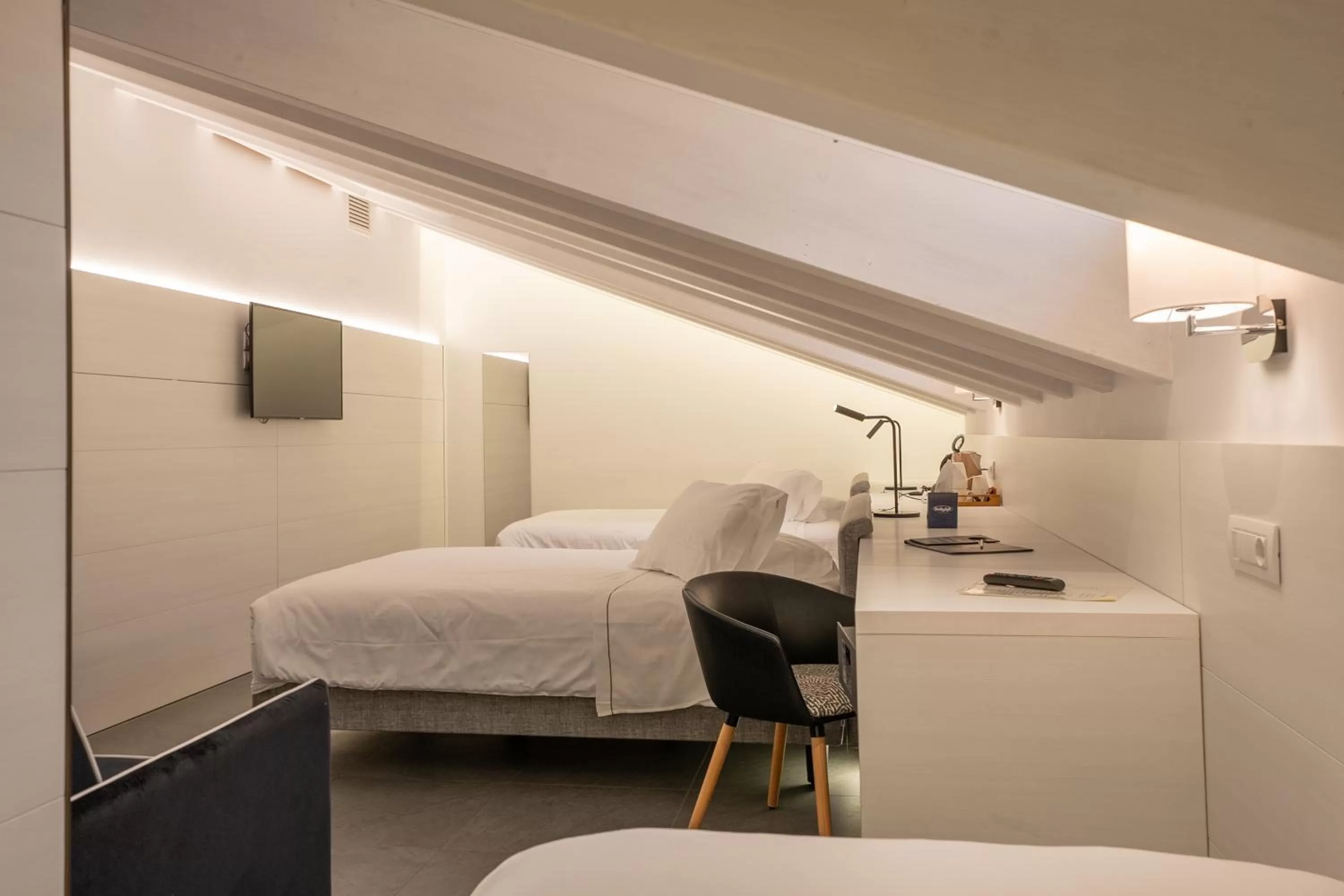 Bed in Boutique Hotel Touring