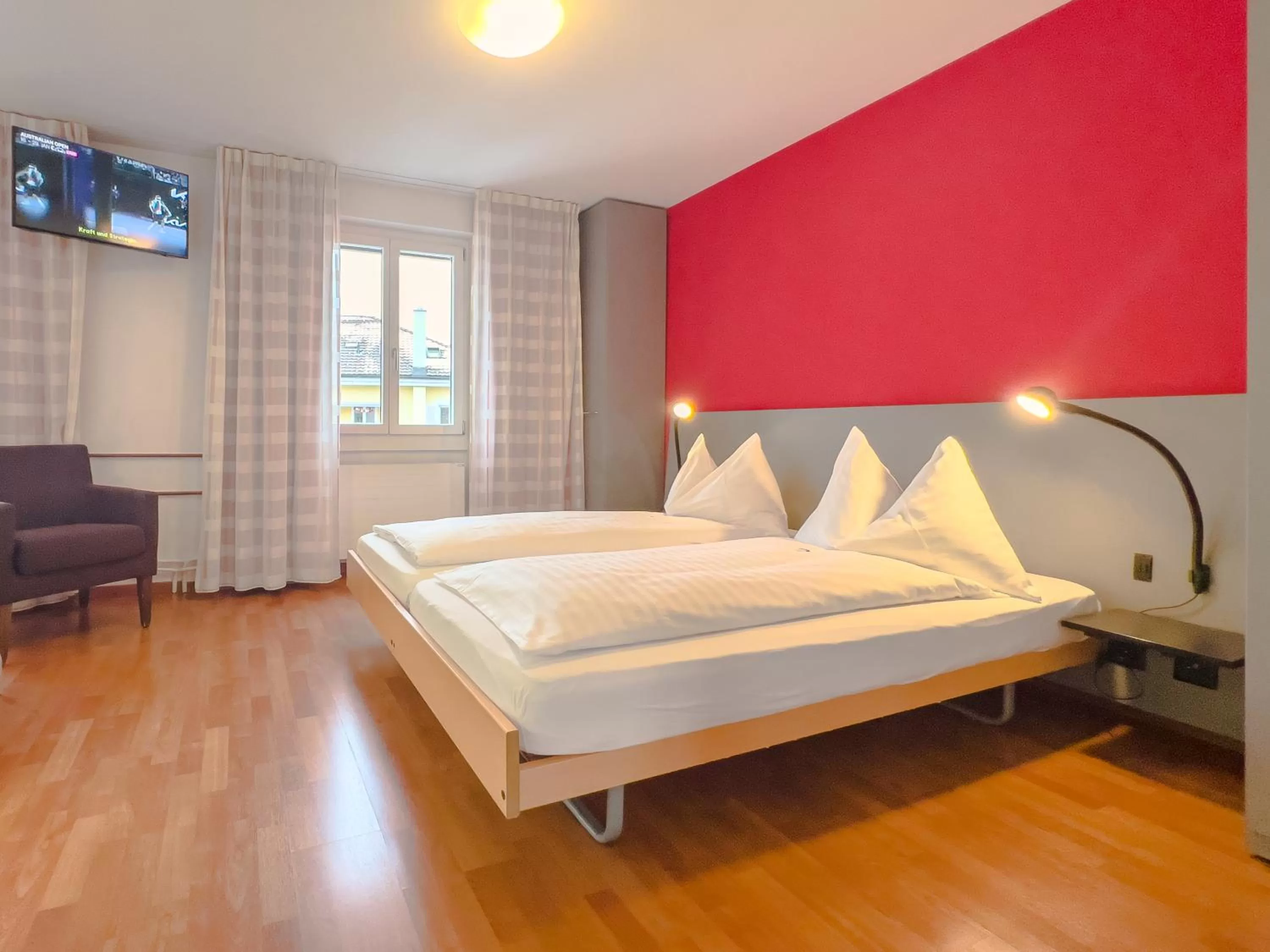 Bed in Hotel Rothaus Luzern & Peruvian Culinary Art