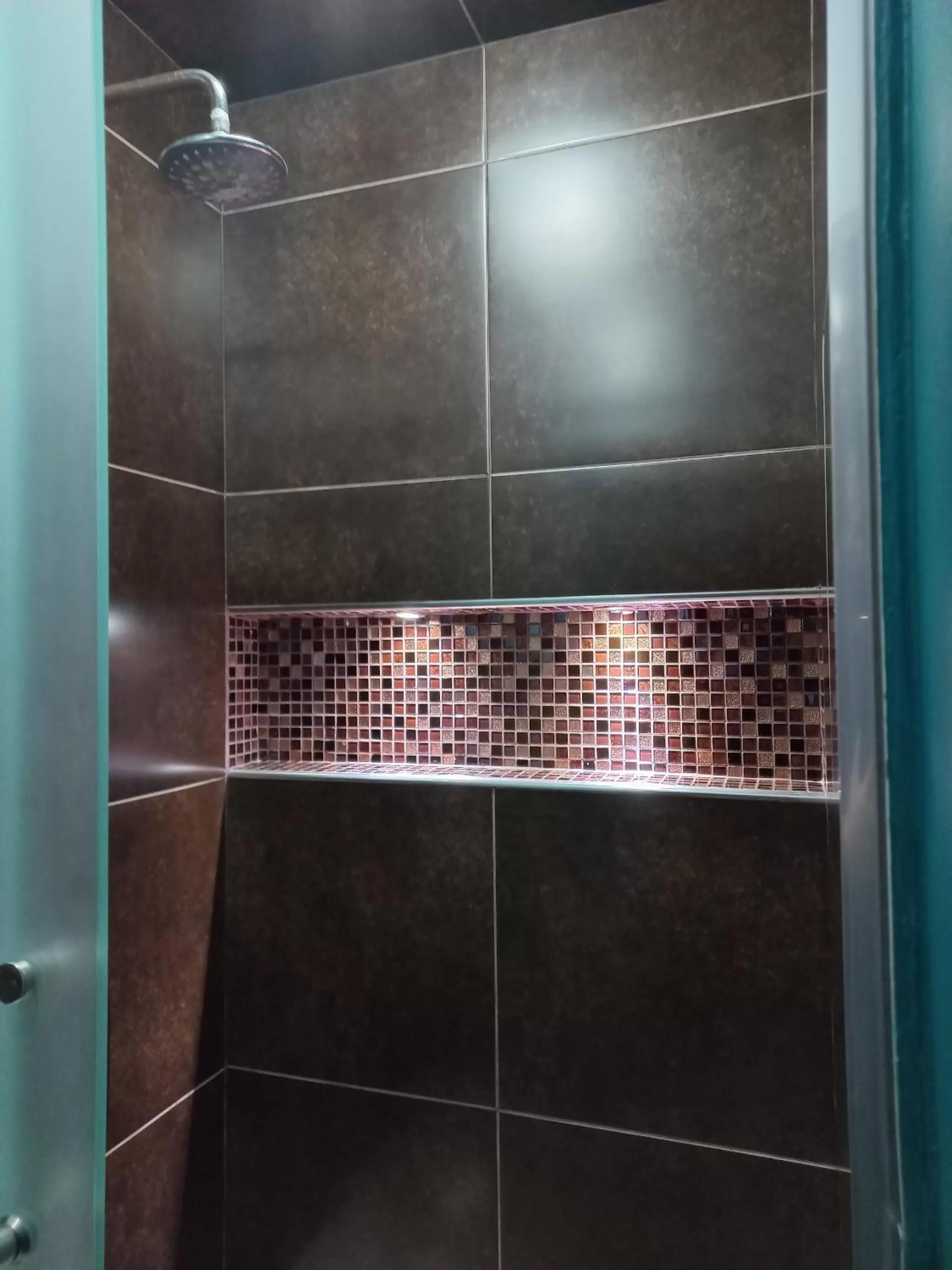 Shower in La Aurora Hotel Like Home