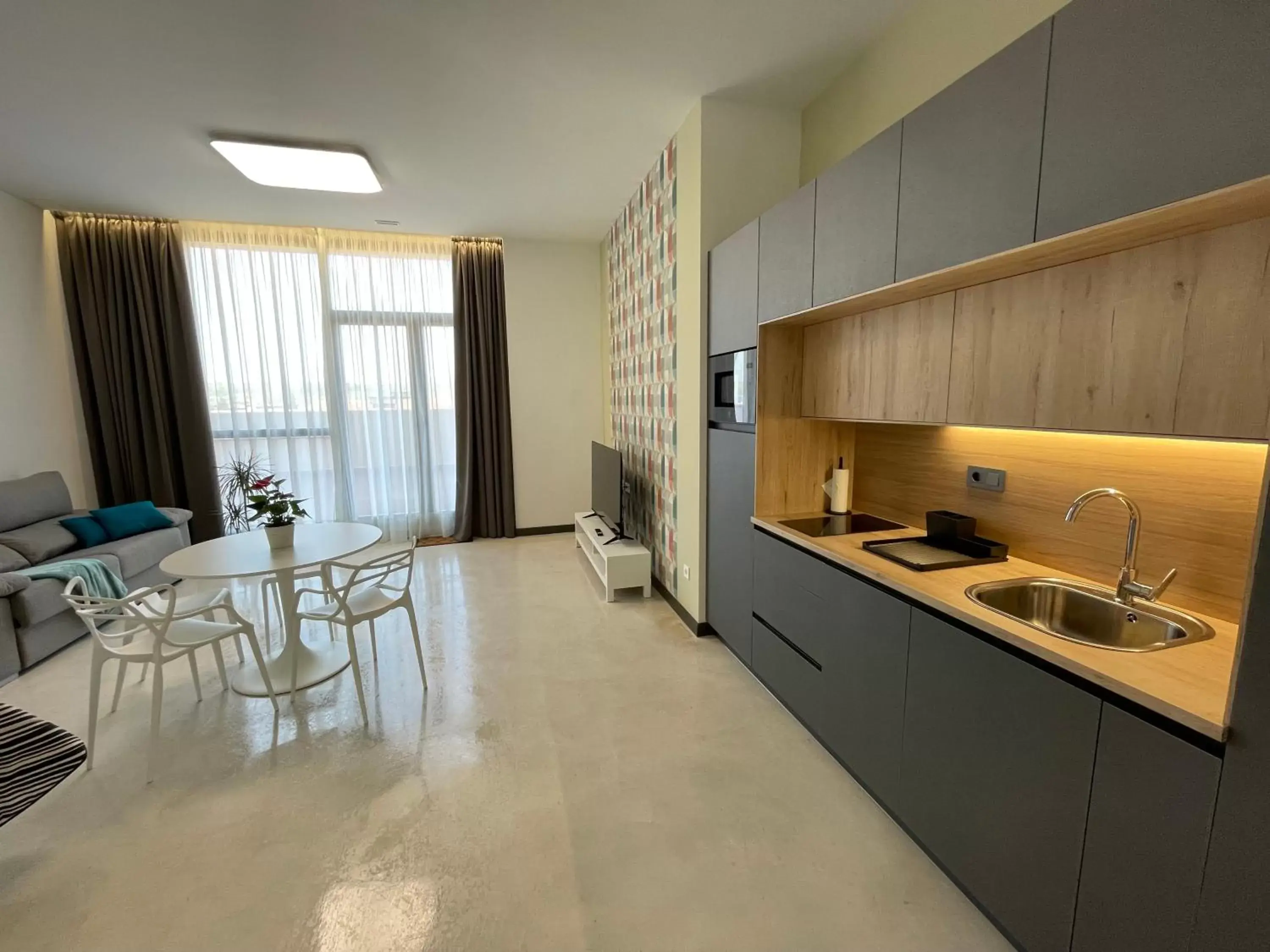 Kitchen/Kitchenette in Apartamentos Aljama