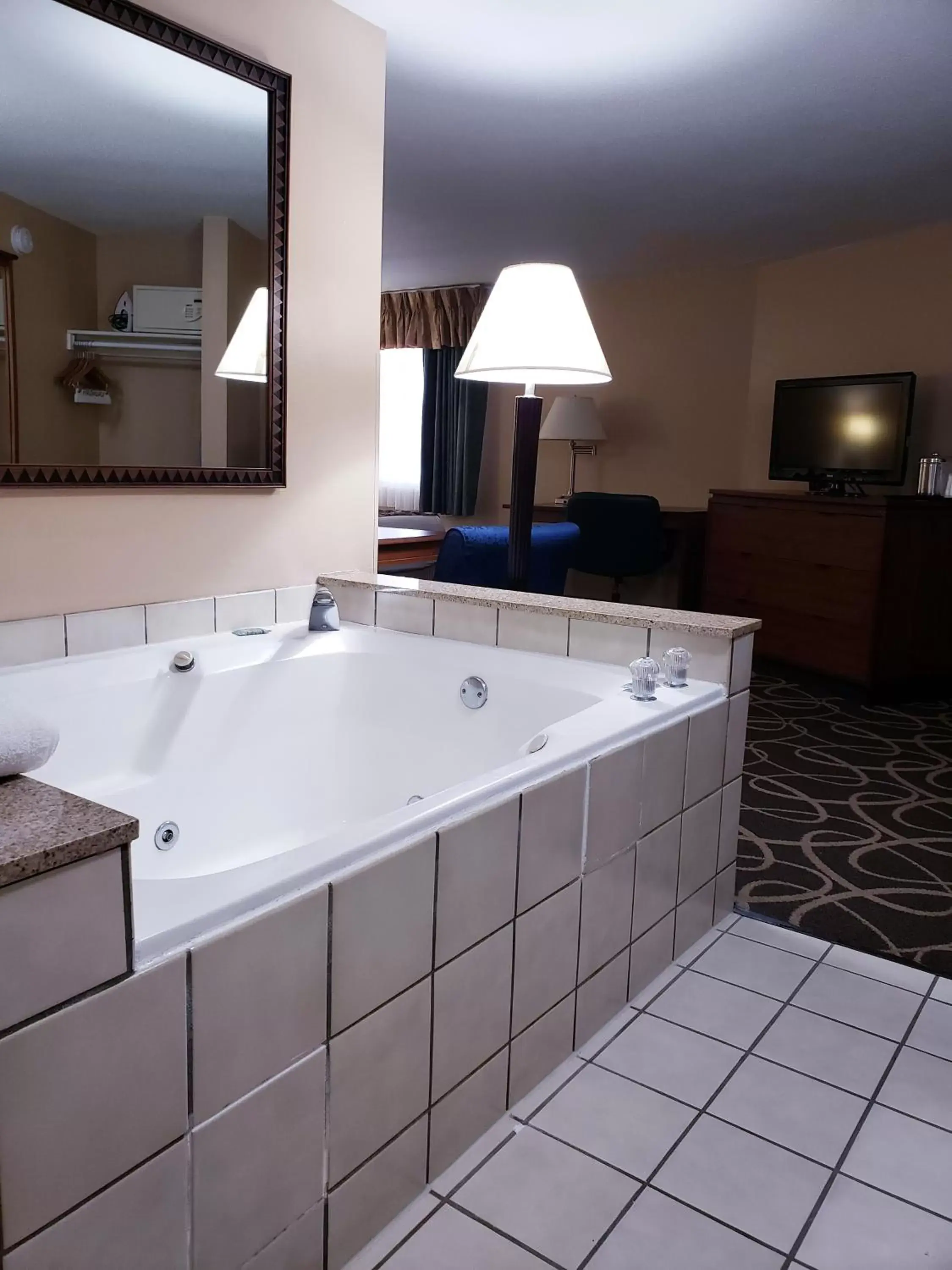 Bathroom in SureStay Plus Hotel by Best Western Black River Falls
