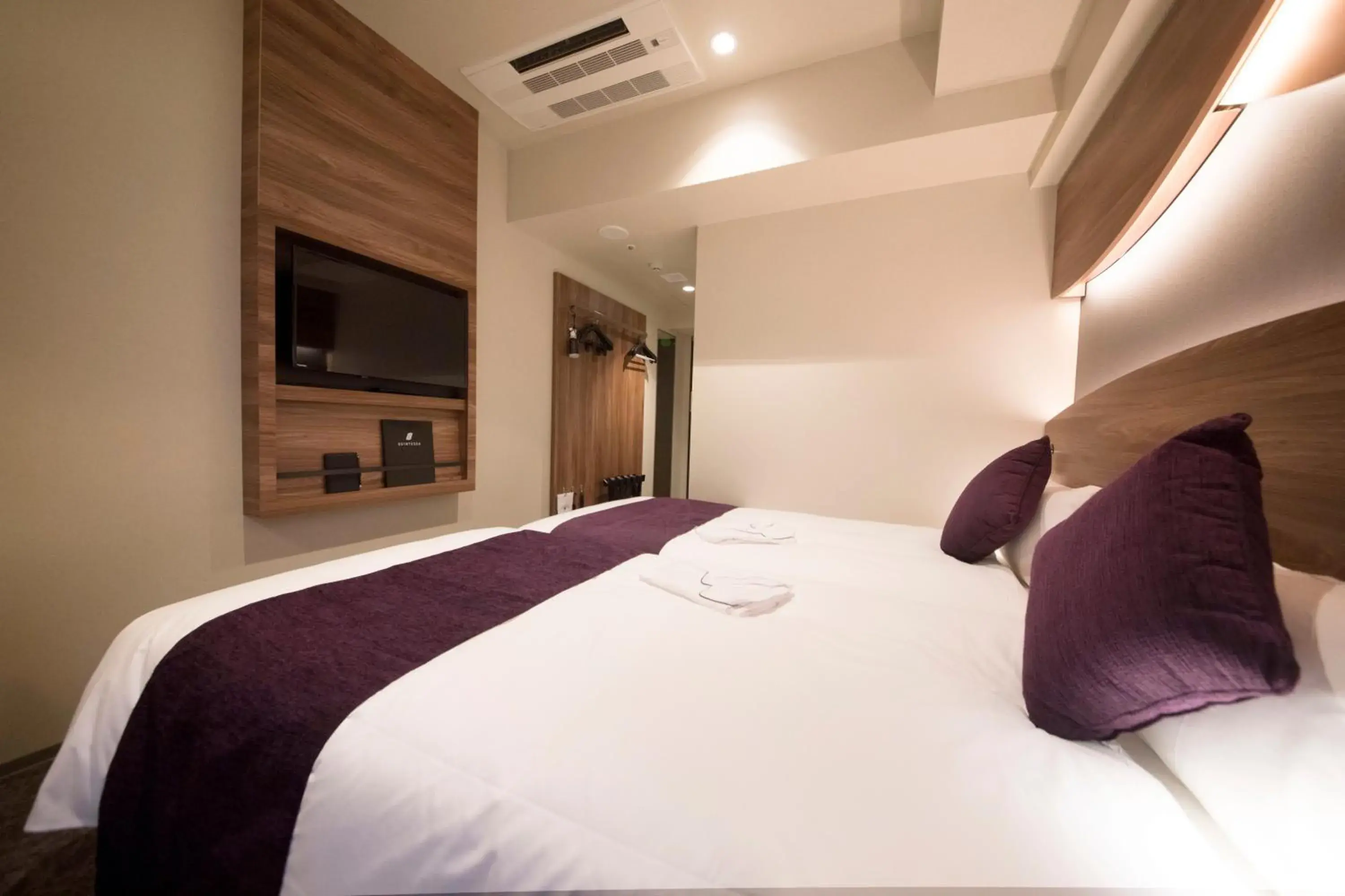 Bed in Quintessa Hotel Tokyo Ginza Bed in Quintessa Hotel Tokyo Ginza