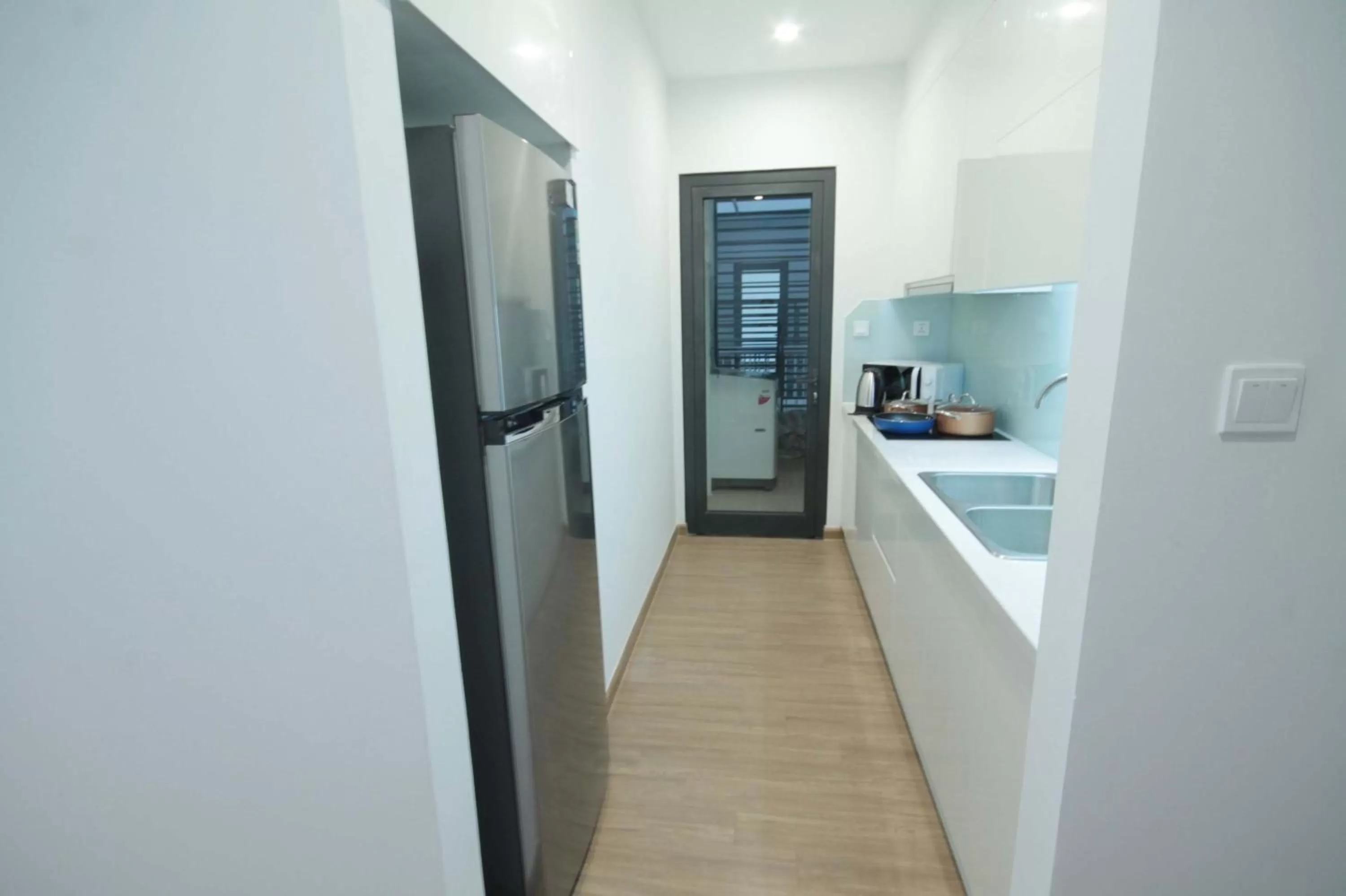 Kitchen/Kitchenette in Vinhomes Skylake Apartment - by Bayhomes