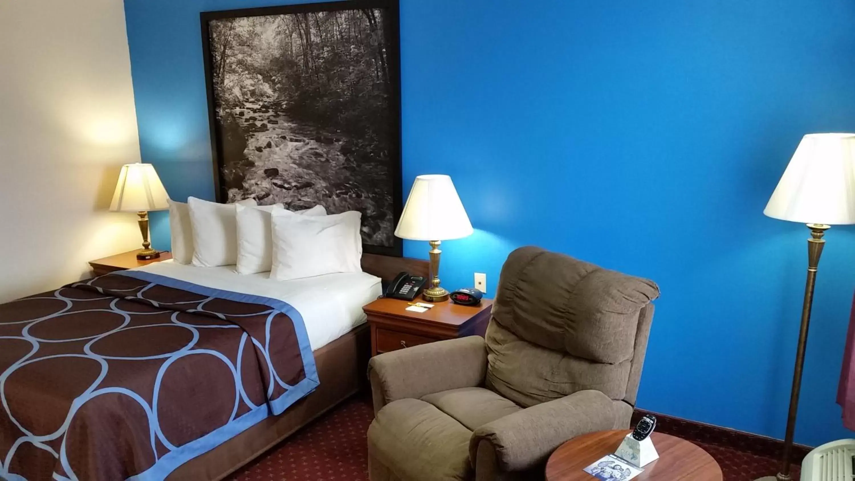 Seating area, Bed in Super 8 by Wyndham McGehee Seating area, Bed in Super 8 by Wyndham McGehee