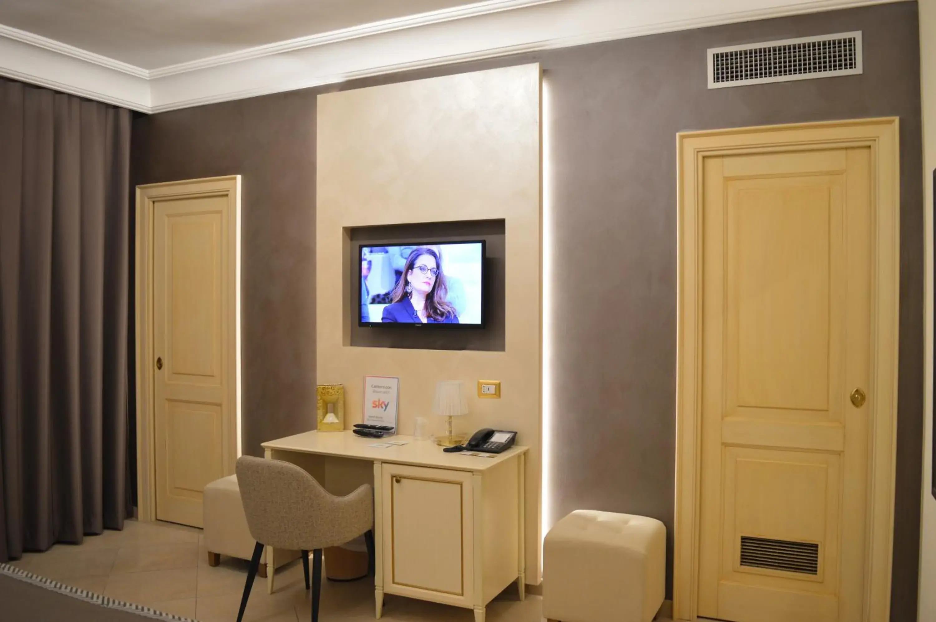 TV/Entertainment Center in Vittorio Emanuele Boutique Hotel